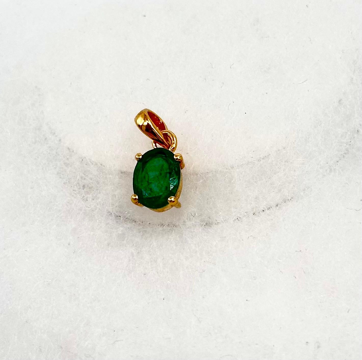 This Stunner Pendant defines class. It completes your everyday look and will also attract special attention on special occasions. This piece of beauty comprises of Natural Zambian Emerald studded in 14K Yellow Gold with excellent diamonds to add