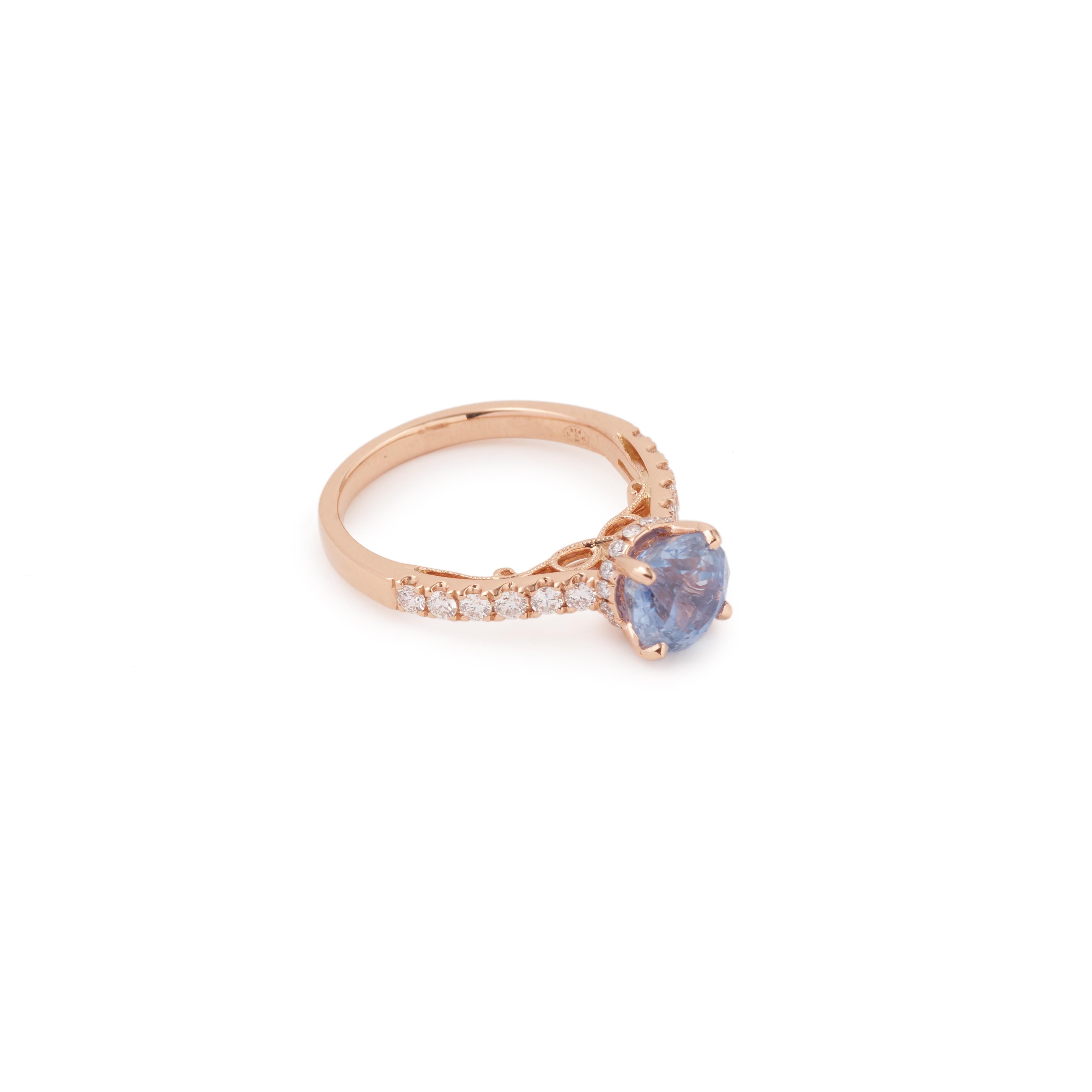 Rose gold ring set with a 2.44 carats round cut sapphire surrounded and shouldered with lines of brilliant diamonds.

Ideal for an engagement !

Sapphire weight : 2.44 carats

With Gem Paris certificate, specifying natural sapphire, without