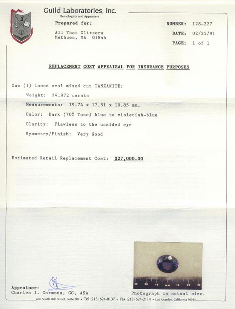 Tanzanite bleue brillante certifiée 24,97 carats du début des années 1990 ! en vente 7