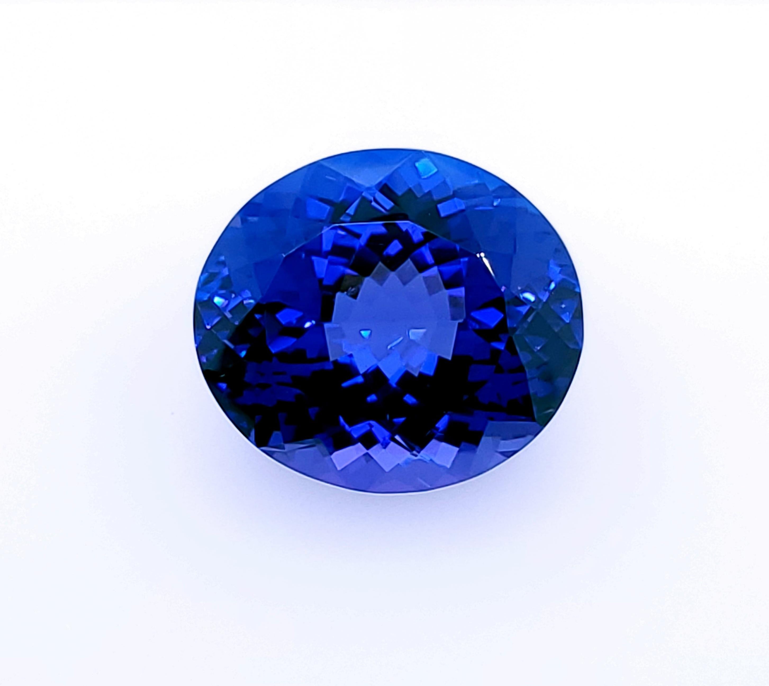 Taille ovale Tanzanite bleue brillante certifiée 24,97 carats du début des années 1990 ! en vente