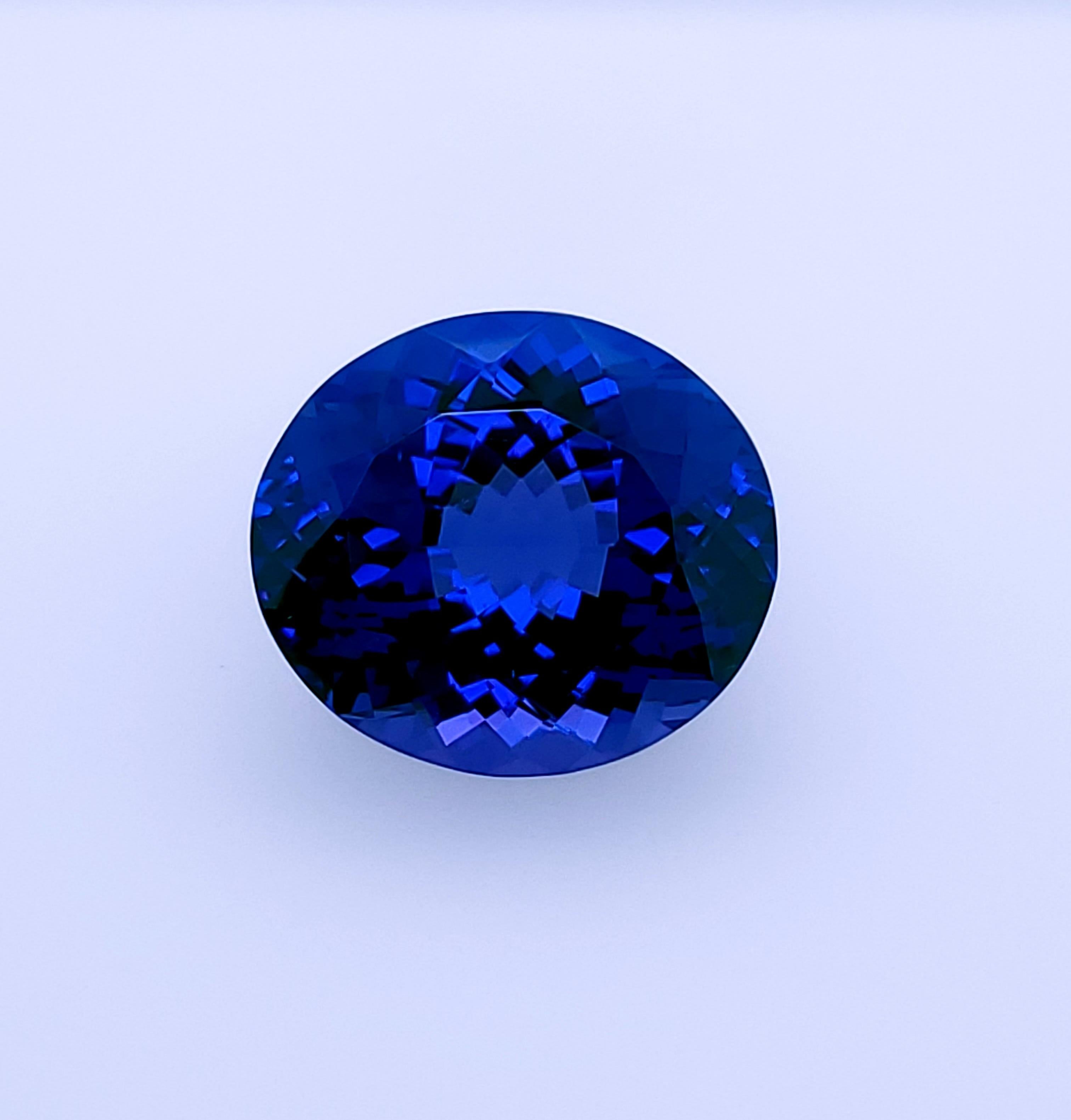 Tanzanite bleue brillante certifiée 24,97 carats du début des années 1990 ! Unisexe en vente