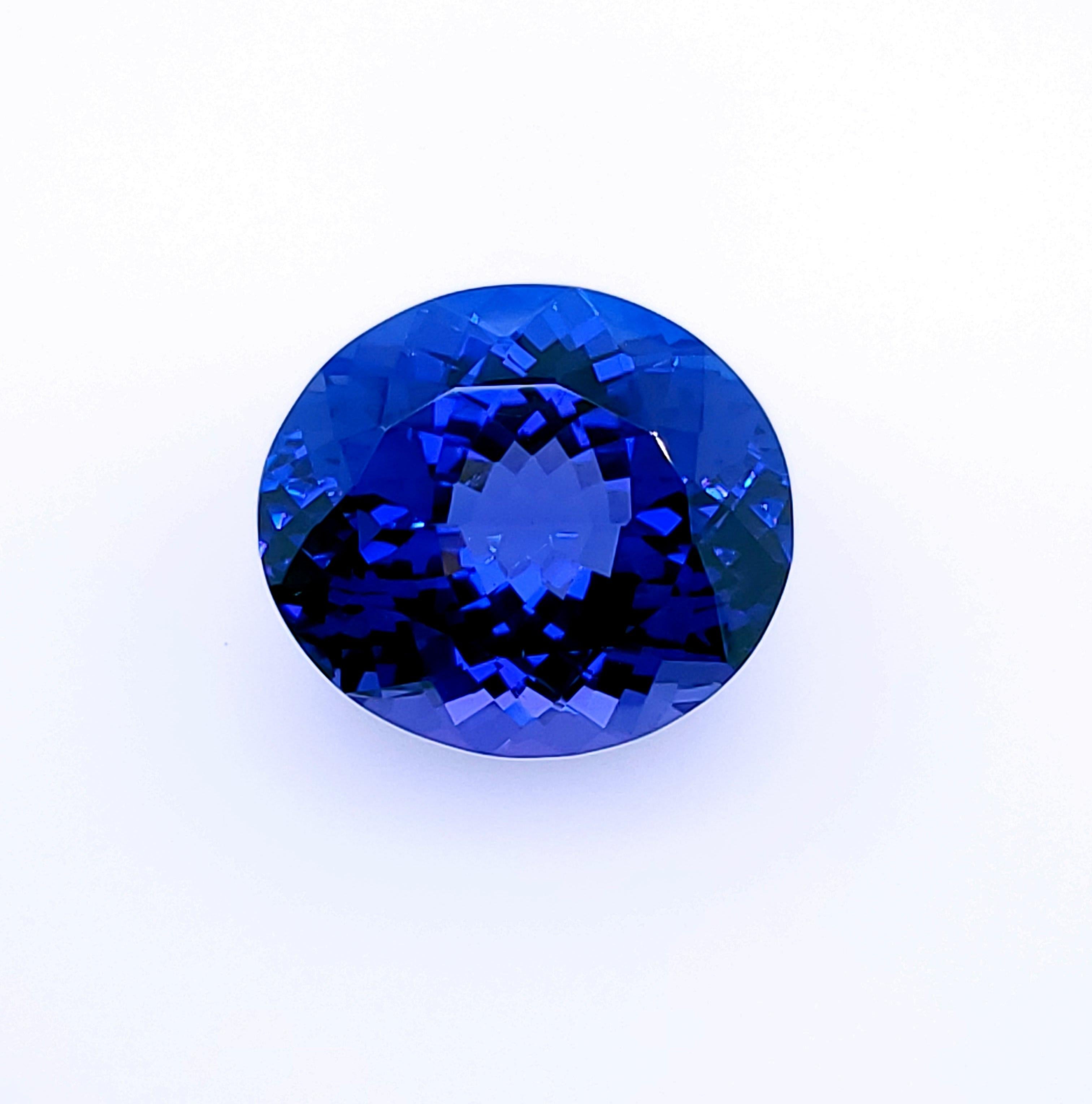 Tanzanite bleue brillante certifiée 24,97 carats du début des années 1990 ! en vente 1
