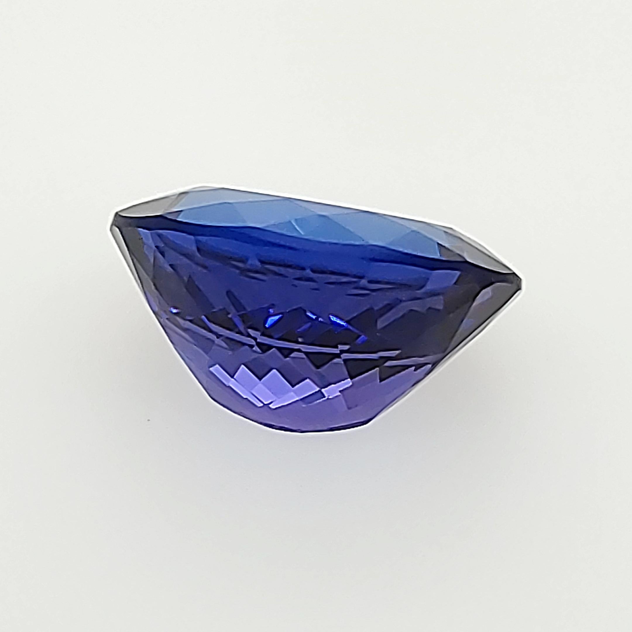 Tanzanite bleue brillante certifiée 24,97 carats du début des années 1990 ! en vente 3