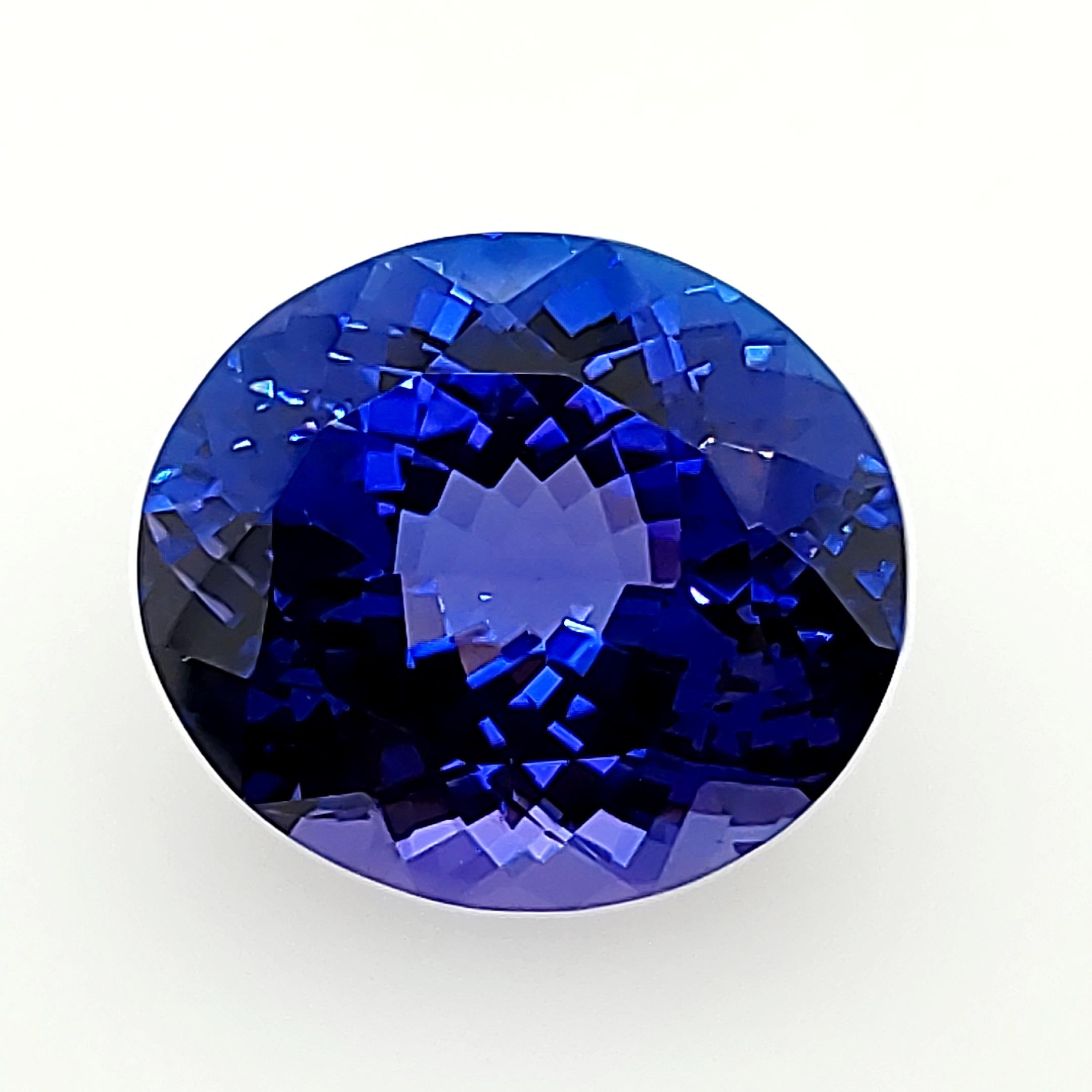 Tanzanite bleue brillante certifiée 24,97 carats du début des années 1990 ! en vente 4