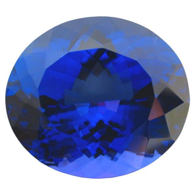 Tanzanite bleue brillante certifiée 24,97 carats du début des années 1990 ! en vente