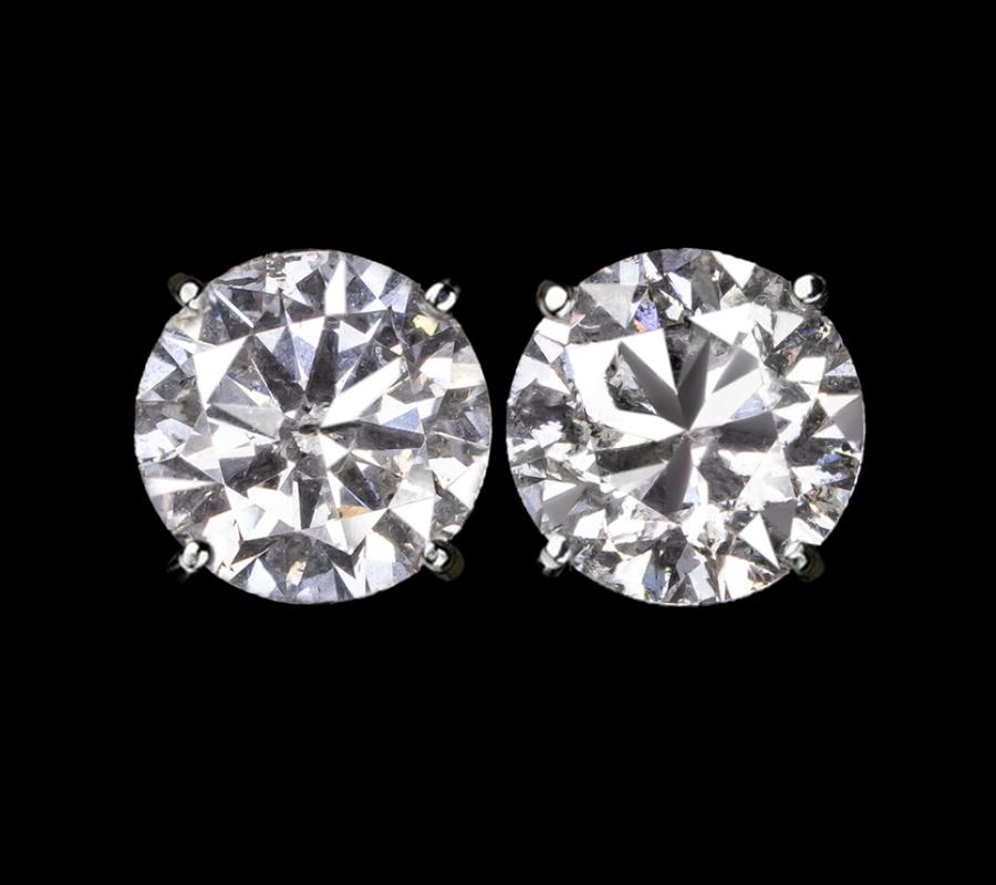 Natural untreated diamond studs
Carat: 2.50 Carats
Color: G
Clarity: Si2 
Cut: Excellent
