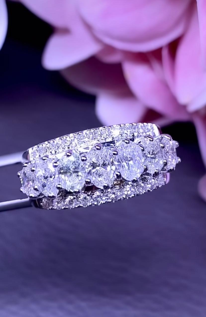An exclusive contemporary design, so luxurious and sophisticated style. Adorn your hands with vibrant diamonds, and add a touch of charm and class on your outfit.
Magnificent ring come with in 18K gold with 7 pieces of Natural Diamonds in perfect