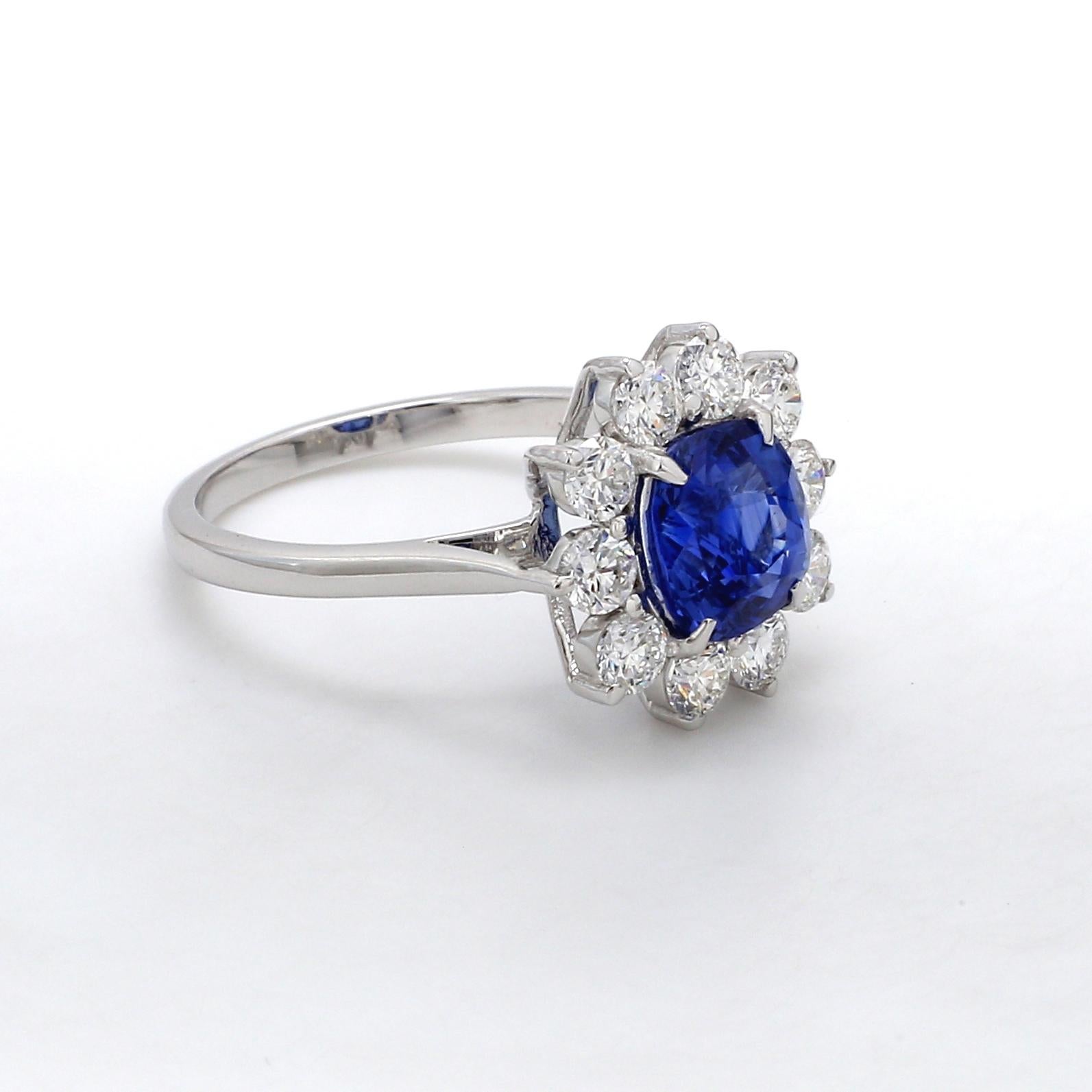A Beautiful Handcrafted Ring in 18 karat White Gold  with Natural No Heat Lotus Certified Blue Sapphire of Madagascar Africa origin and Brilliant Cut Colorless Diamonds.

Sapphire Details
Weight: 2.55 carats (7.69 x 7.18 x 5.18 mm )
Color: Corn