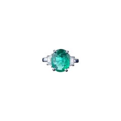 Used Certified 2.56 Carat Oval Shape Emerald and Diamond Three-Stone Engagement Ring