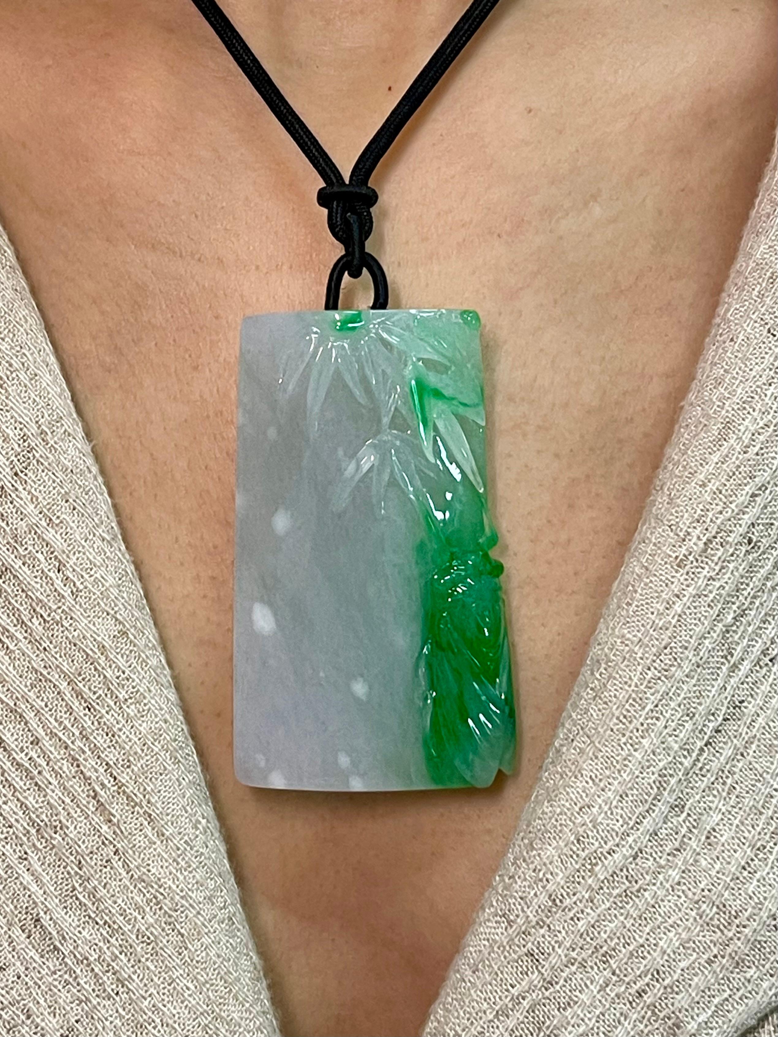 Please check out the HD video. This is certified natural jadeite jade by two labs. The carved jade Cicada and bamboo pendant is classically strung with a traditional cord. It is well carved on both sides. Cicada carvings symbolizes immortality and