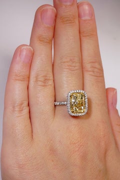 2.67ct Certified Fancy Yellow Radiant Diamond Ring