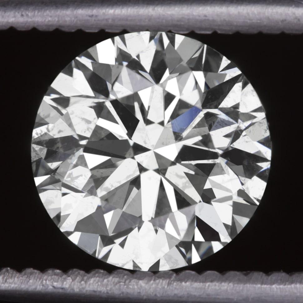 2 carat round brilliant cut certified diamond is beautifully white, eye clean, and displays stunning, lively sparkle! Certified by EGL the diamond is eye clean, the inclusions are small and well distributed; they disappear completely into the