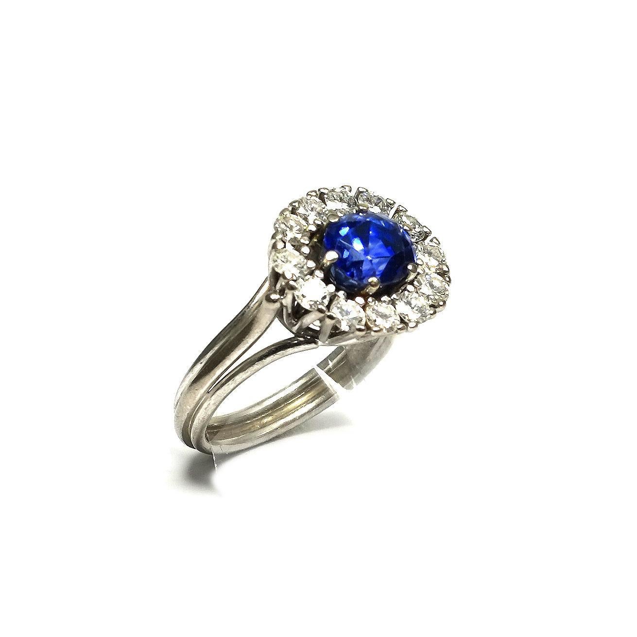 Certified 2.7 Carat Sapphire and Diamond Cluster Ring in Platinum

Classically elegant cluster ring set with an oval, natural cornflower blue sapphire of 2.70 ct in a setting of 12 brilliant cut diamonds with a total weight of 1.14 carat.


