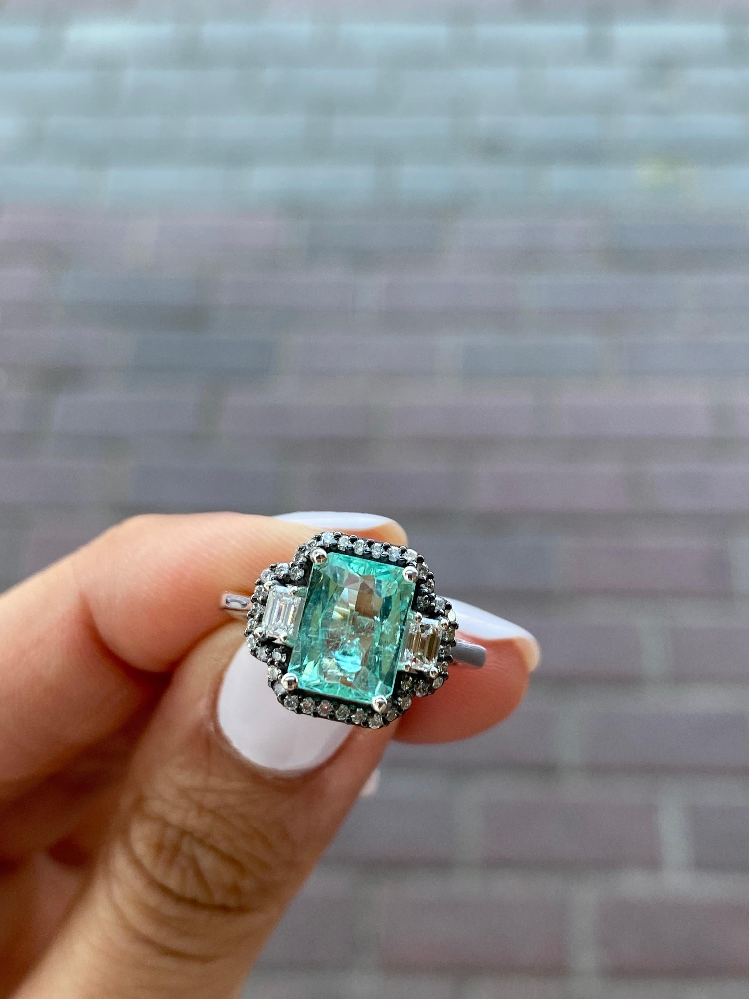 diamond ring with aquamarine side stones