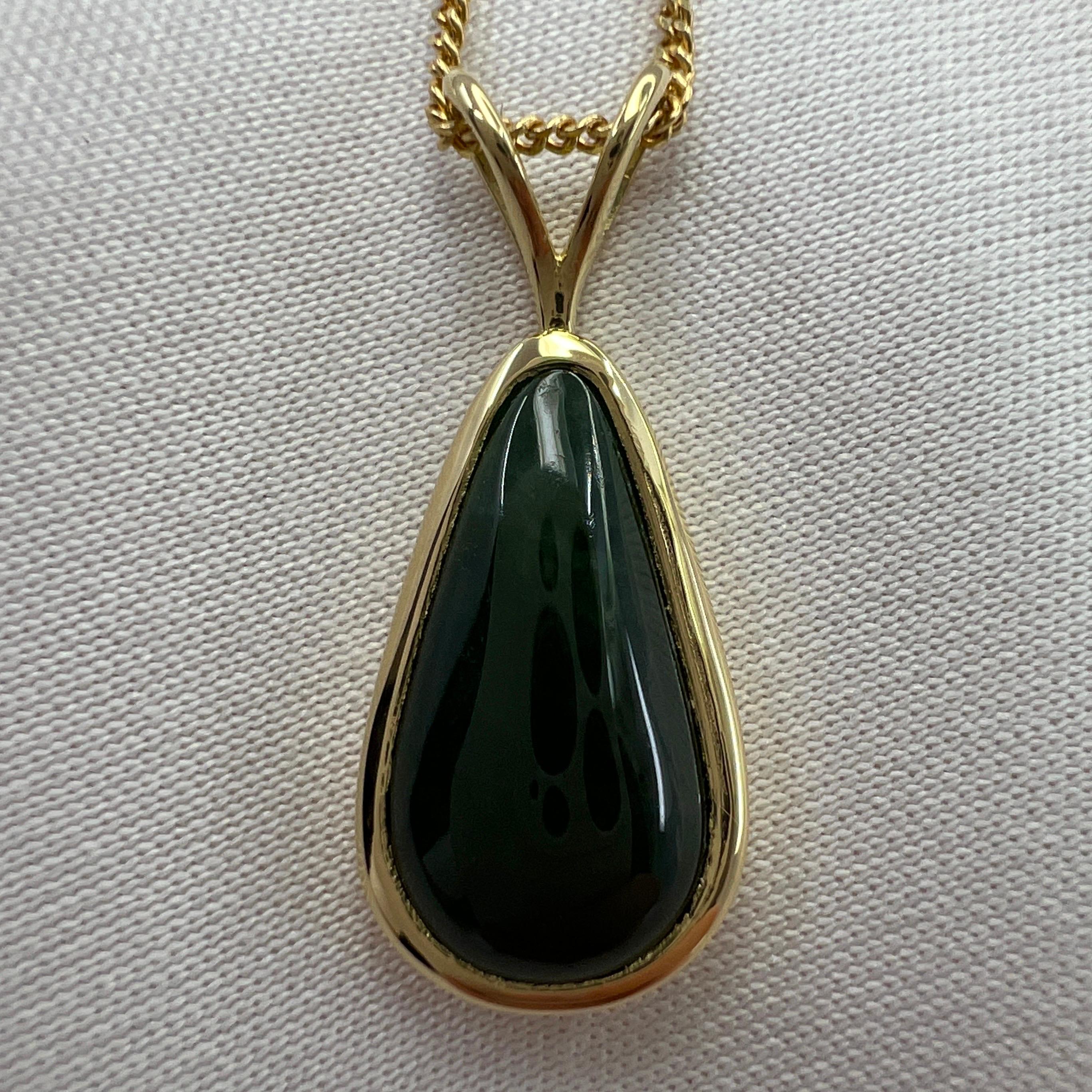 IGI Certified A-Grade Deep Green Jadeite 18k Gold Pendant Necklace.

Stunning 2.76 carat untreated deep green jadeite jade set in a fine 18k yellow gold solitaire pendant.

Has an excellent pear cabochon cut showing the colour beautifully. Fine deep