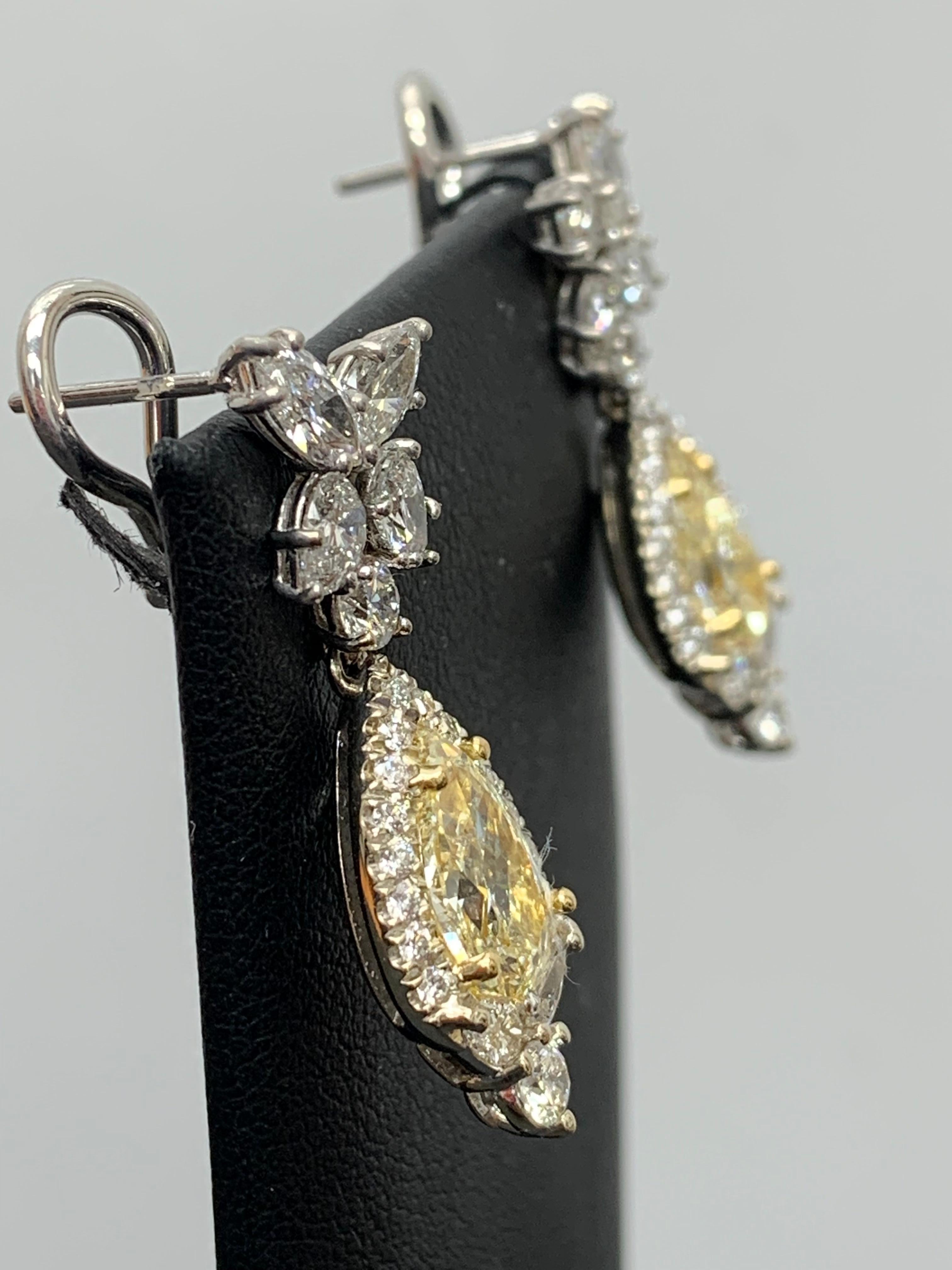 CERTIFIED 2.89 Carat Fancy Yellow Diamond Drop Earrings in 18K White Gold For Sale 4