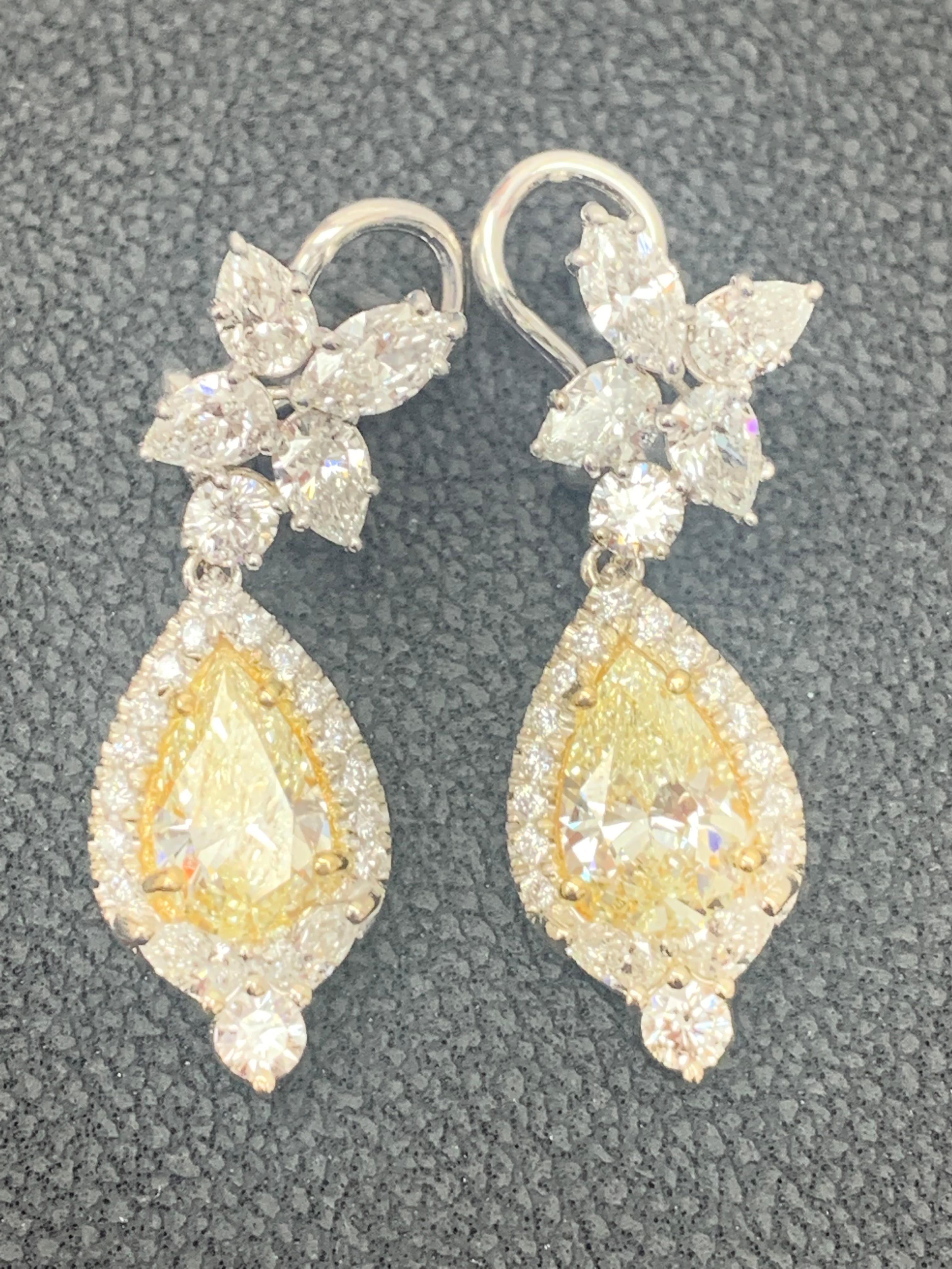 Contemporary CERTIFIED 2.89 Carat Fancy Yellow Diamond Drop Earrings in 18K White Gold For Sale