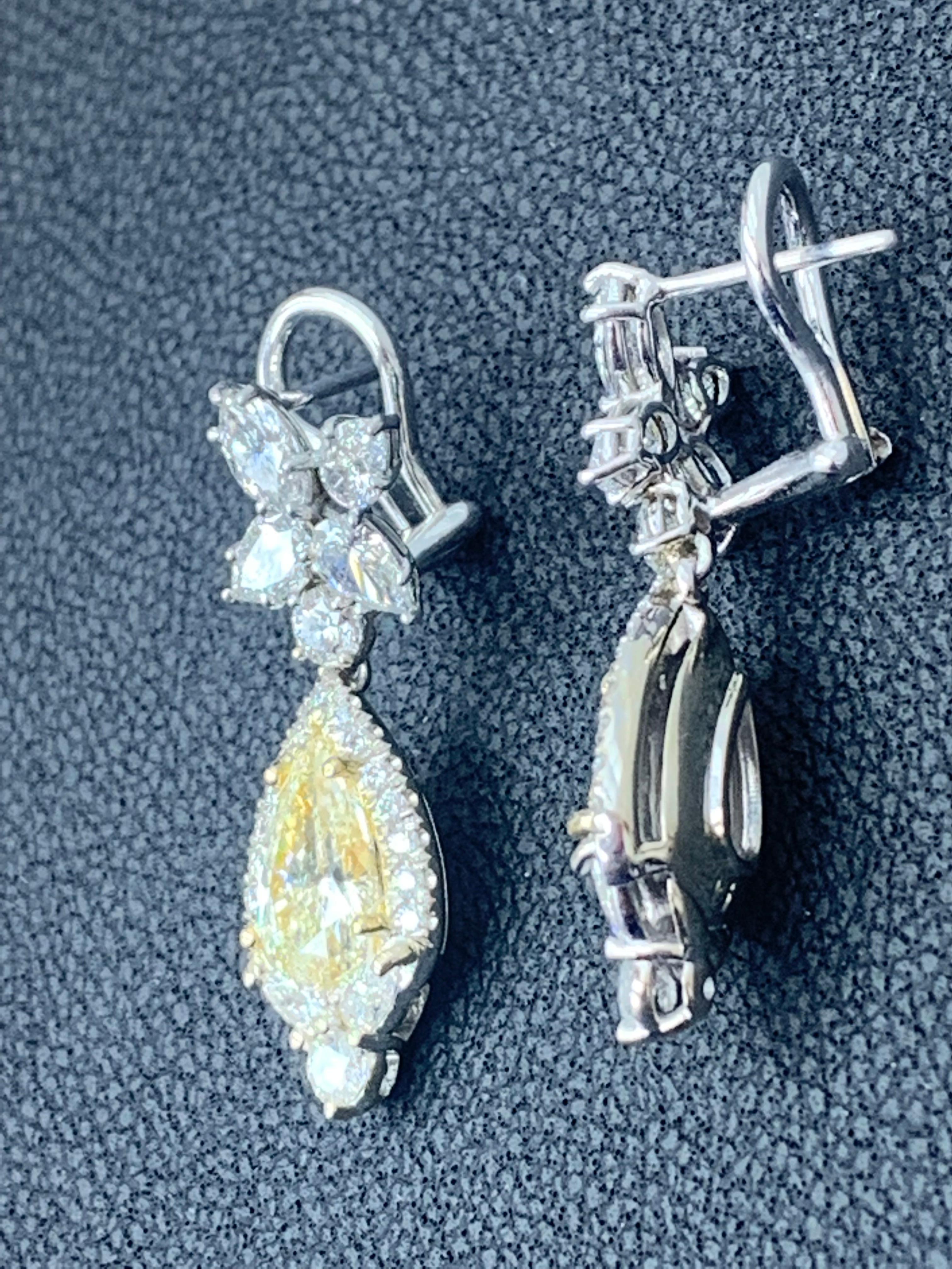 Women's CERTIFIED 2.89 Carat Fancy Yellow Diamond Drop Earrings in 18K White Gold For Sale