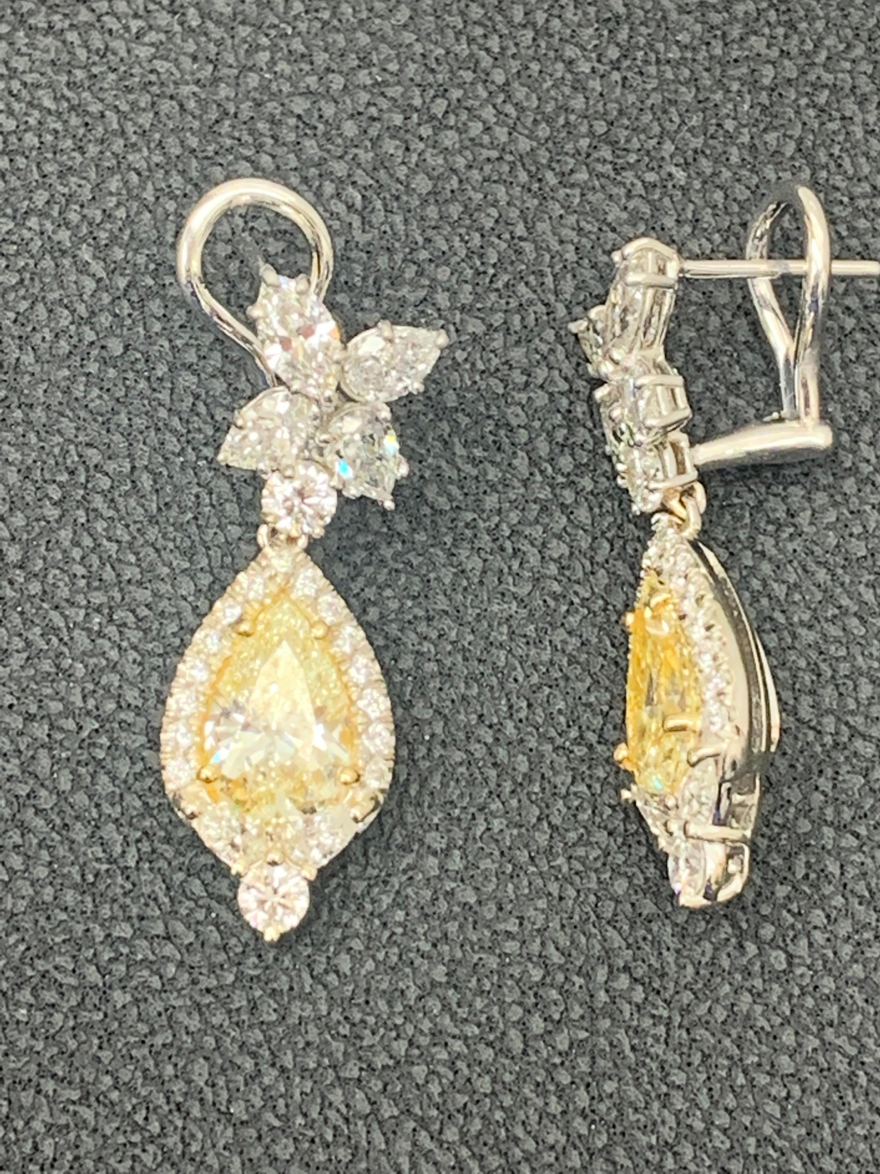 CERTIFIED 2.89 Carat Fancy Yellow Diamond Drop Earrings in 18K White Gold For Sale 1