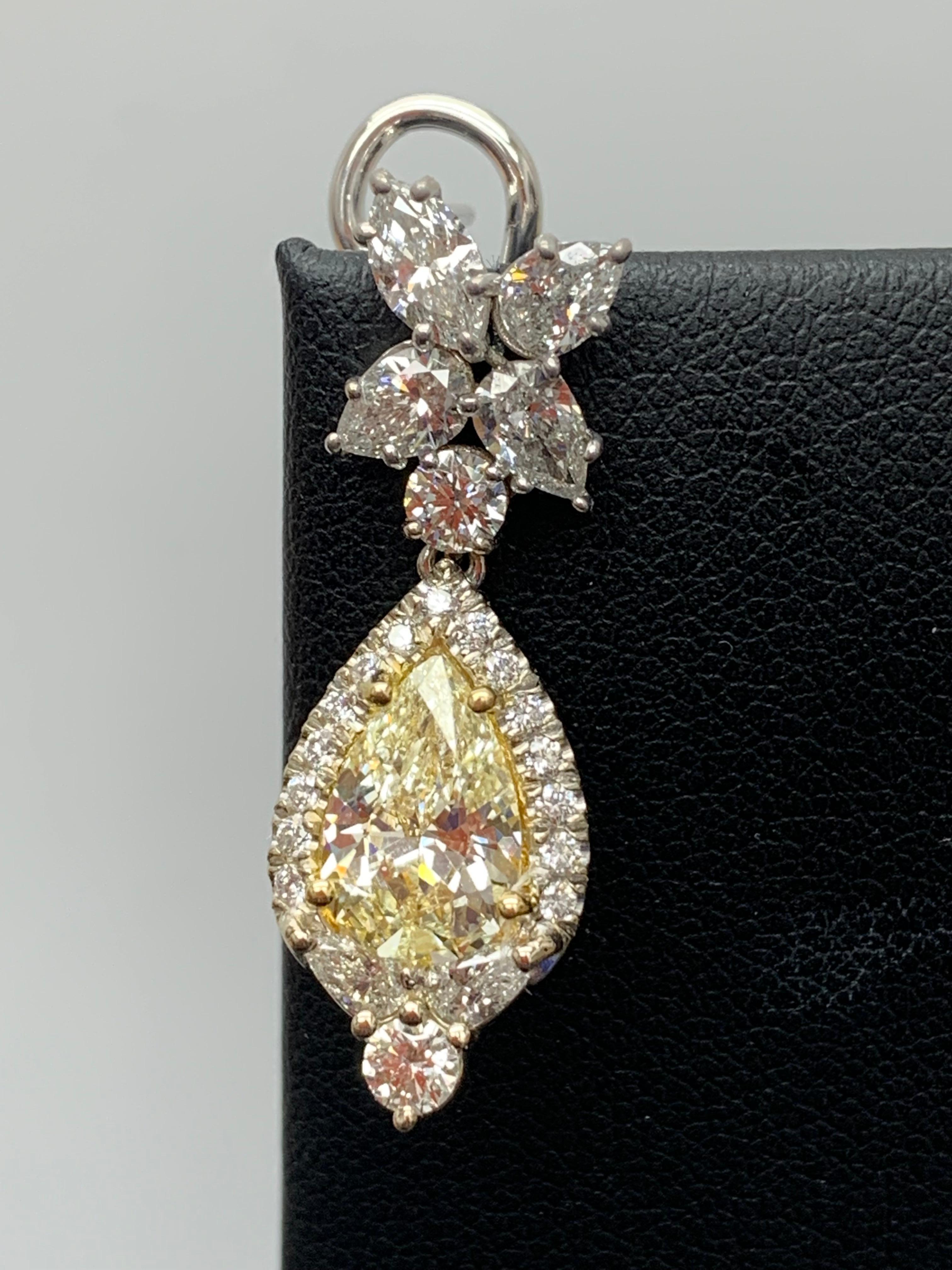 CERTIFIED 2.89 Carat Fancy Yellow Diamond Drop Earrings in 18K White Gold For Sale 3