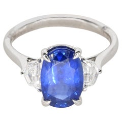 Certified 3 Carat Blue Oval Shape Sapphire 18K Cocktail Ring