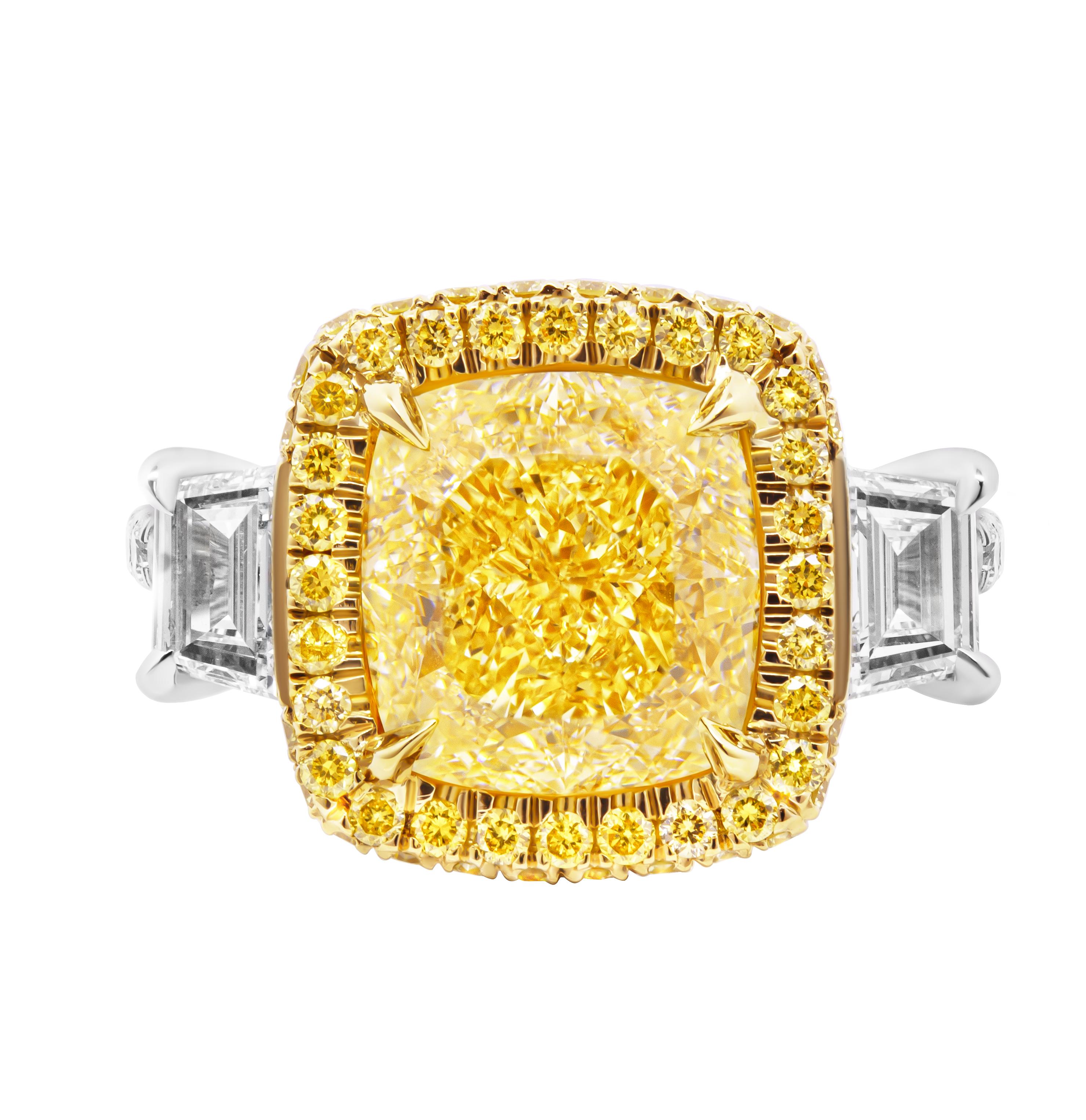 Certified 3 Stone Ring with 4.14ct Fancy Light Yellow Diamond VVS2
In Platinum & 18k Yellow Gold 
Center stone:
4.14ct Natural Fancy Light Yellow Even VVS2 Cushion
cut GIA#6461277870
Two side stones:
0.31ct E VS2 GIA#7466315215 trapezoid