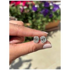 Certified 3.02 Carat Emerald Cut Diamond Studs