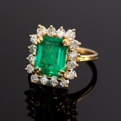 Bague halo en or 18 carats avec émeraude colombienne mineure de 3,04 carats certifiée