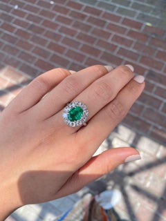Certified 3.12 Carat Oval Emerald and Rose-Cut Diamond Engagement Ring