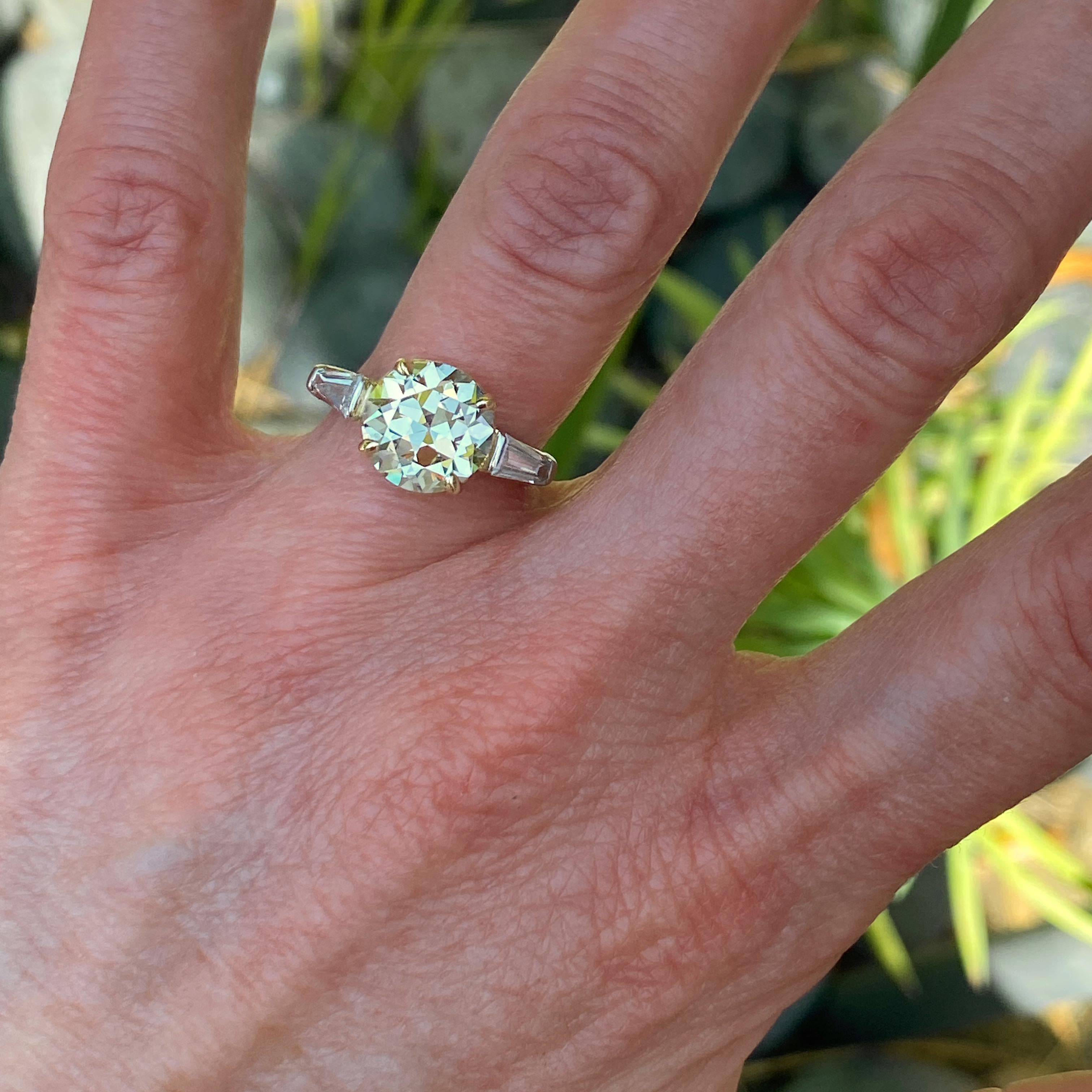 This beautiful old diamond came to us mounted in an enormous, over-the-top Retro-era bowtie cocktail ring.  We had this ring appraised by Charles Carmona of Guild Labs in Los Angeles.  Mr. Carmona concluded the diamond was much older than the