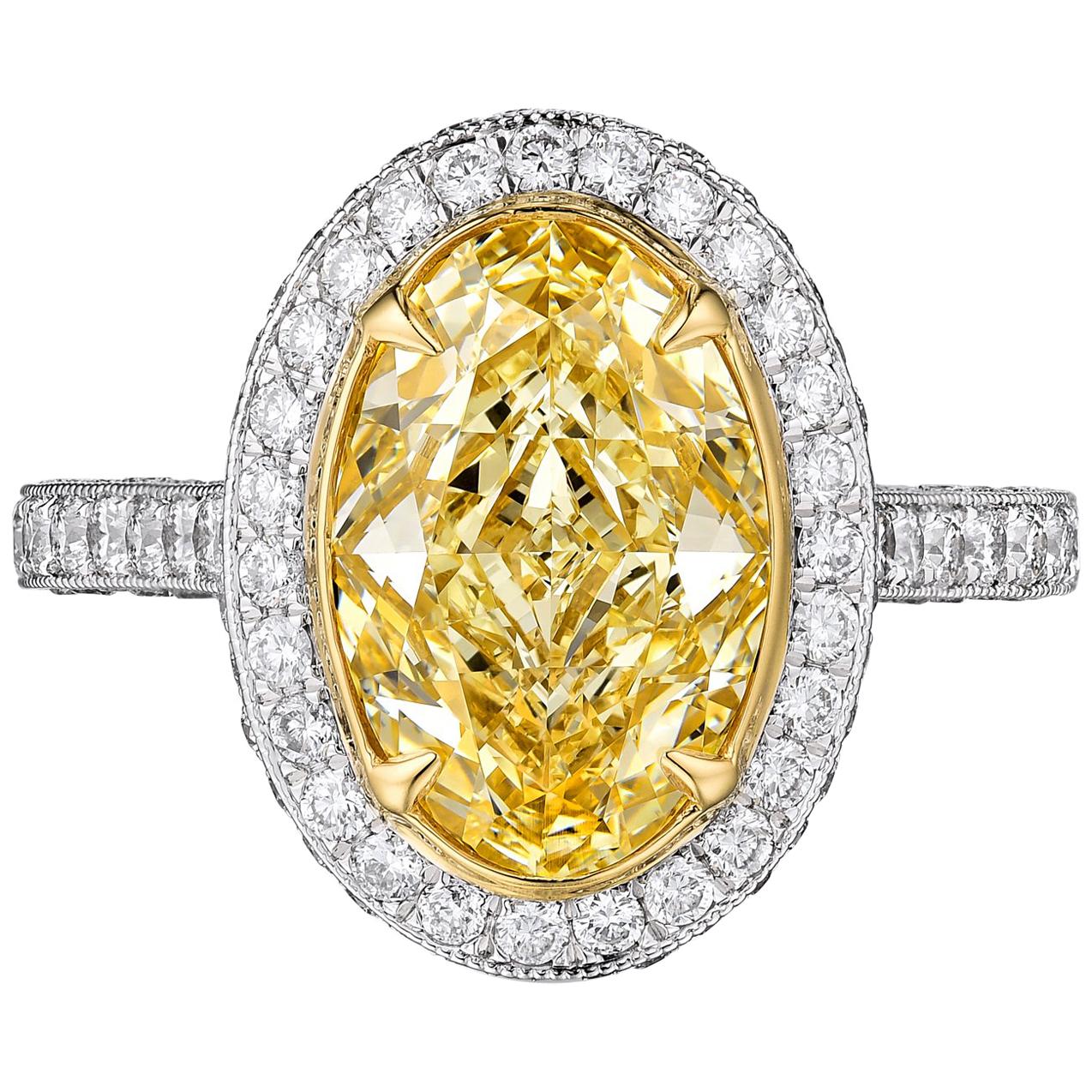 Certified 3.17 Carat Fancy Yellow Oval Diamond Engagement Ring in Platinum