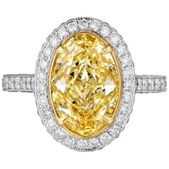 Certified 3.17 Carat Fancy Yellow Oval Diamond Engagement Ring in Platinum