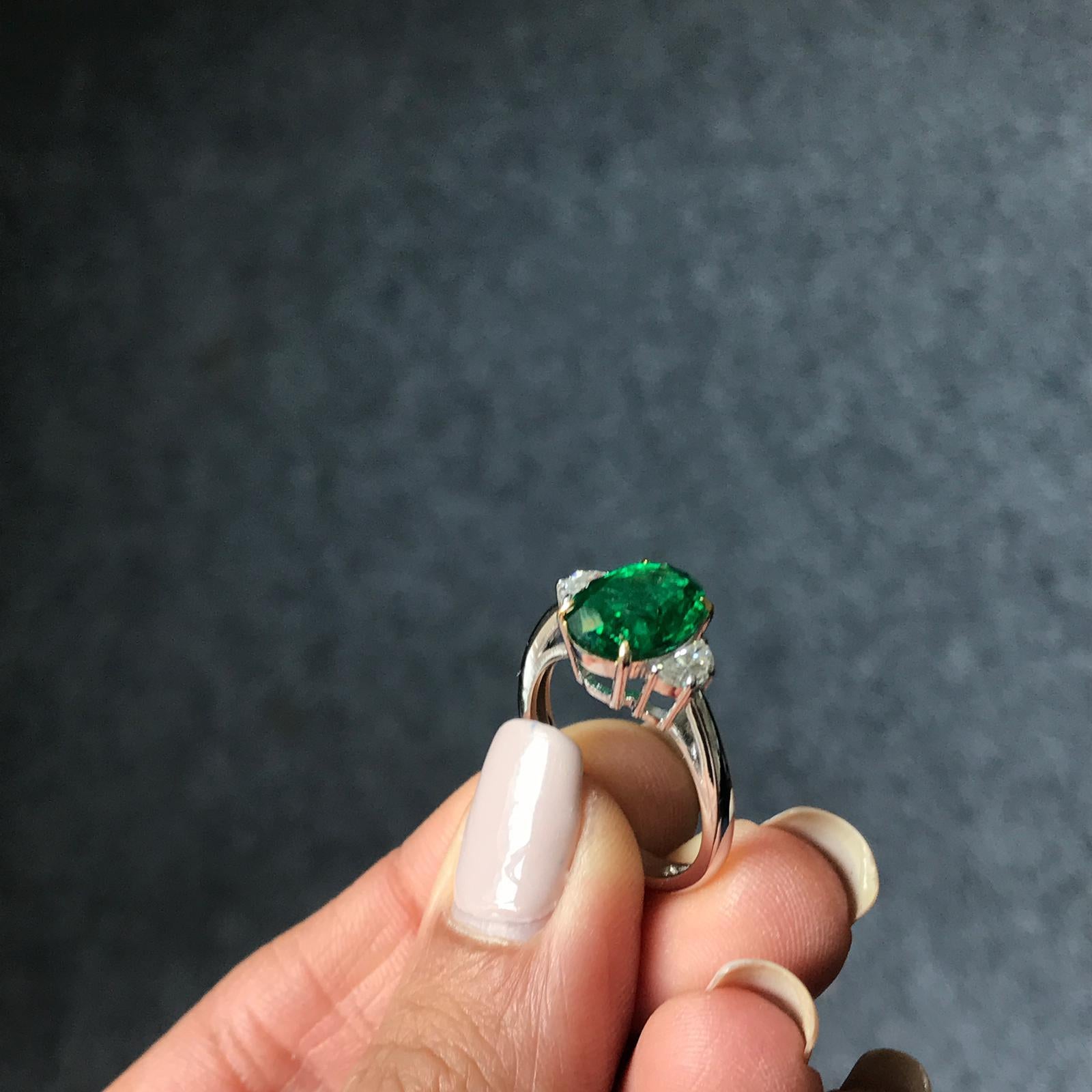 oval emerald and diamond ring