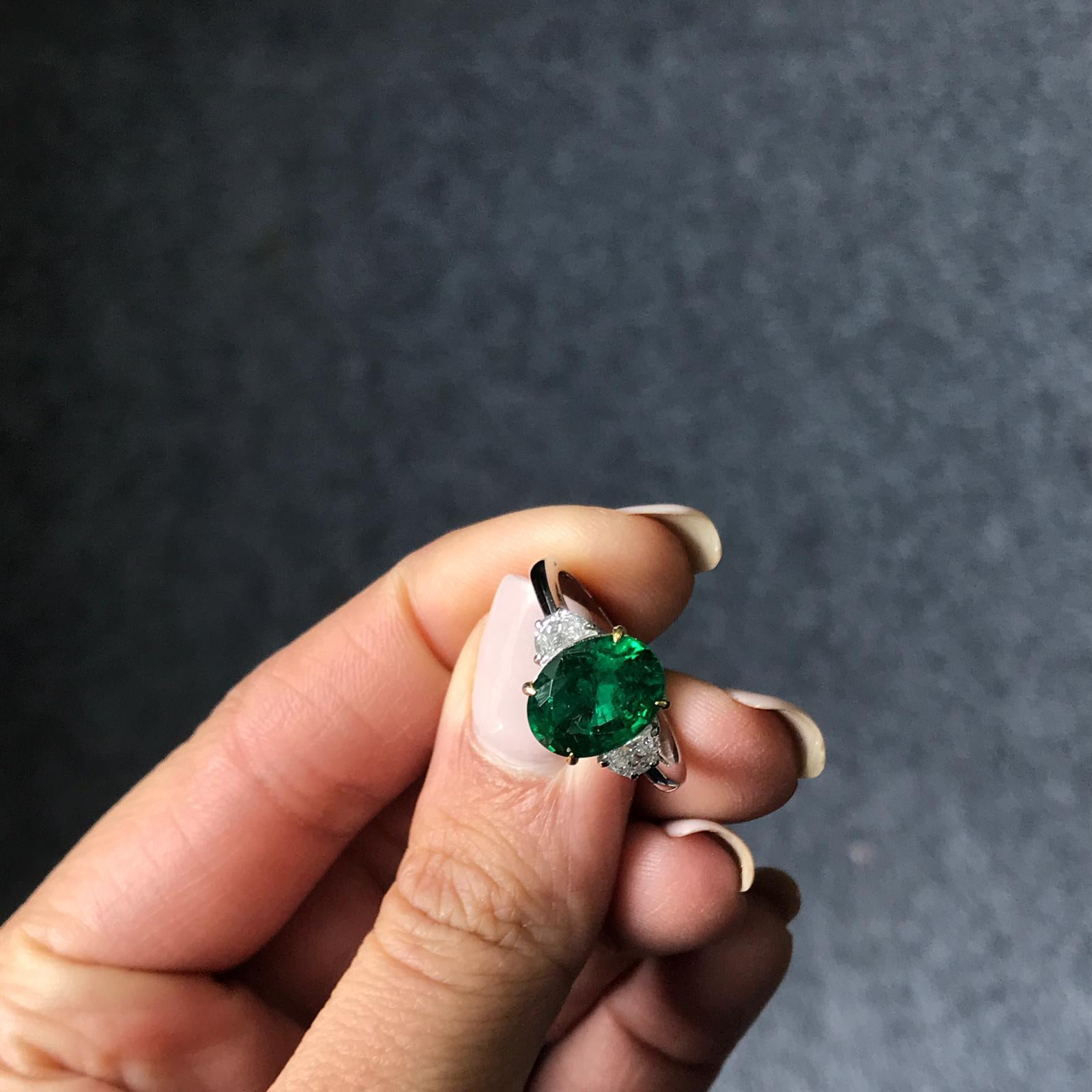 oval emerald engagement rings