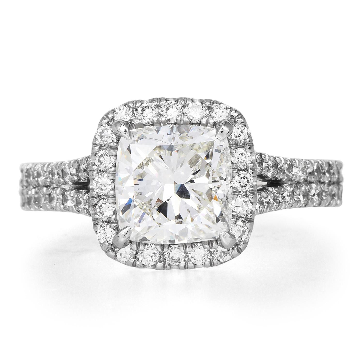 Elegant and Highly Sparkly Engagement Ring.

Inspired by ta halo style, is the perfect piece for that special person. 

Crafted in solid Platinum, the center is adorned by an EGL certified 2.02 carat, Cushion modified cut Diamond, H-I color & VS2