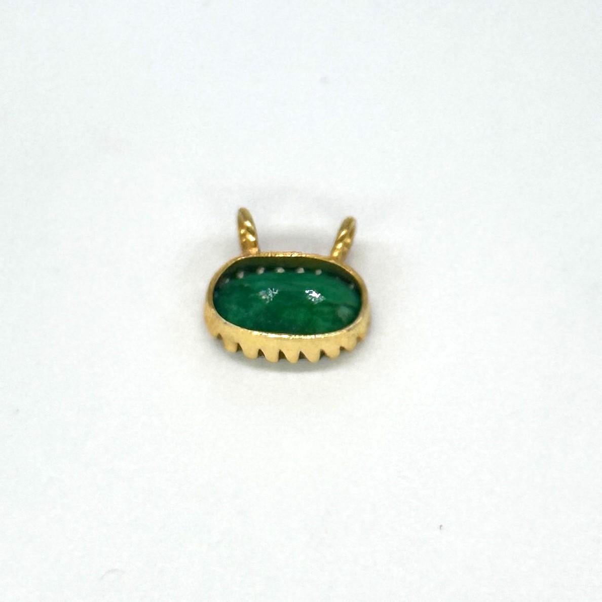 This Stunner Pendant defines class. It completes your everyday look and will also attract special attention on special occasions. This piece of beauty comprises of Natural Zambian Emerald studded in 14K Yellow Gold with excellent diamonds to add