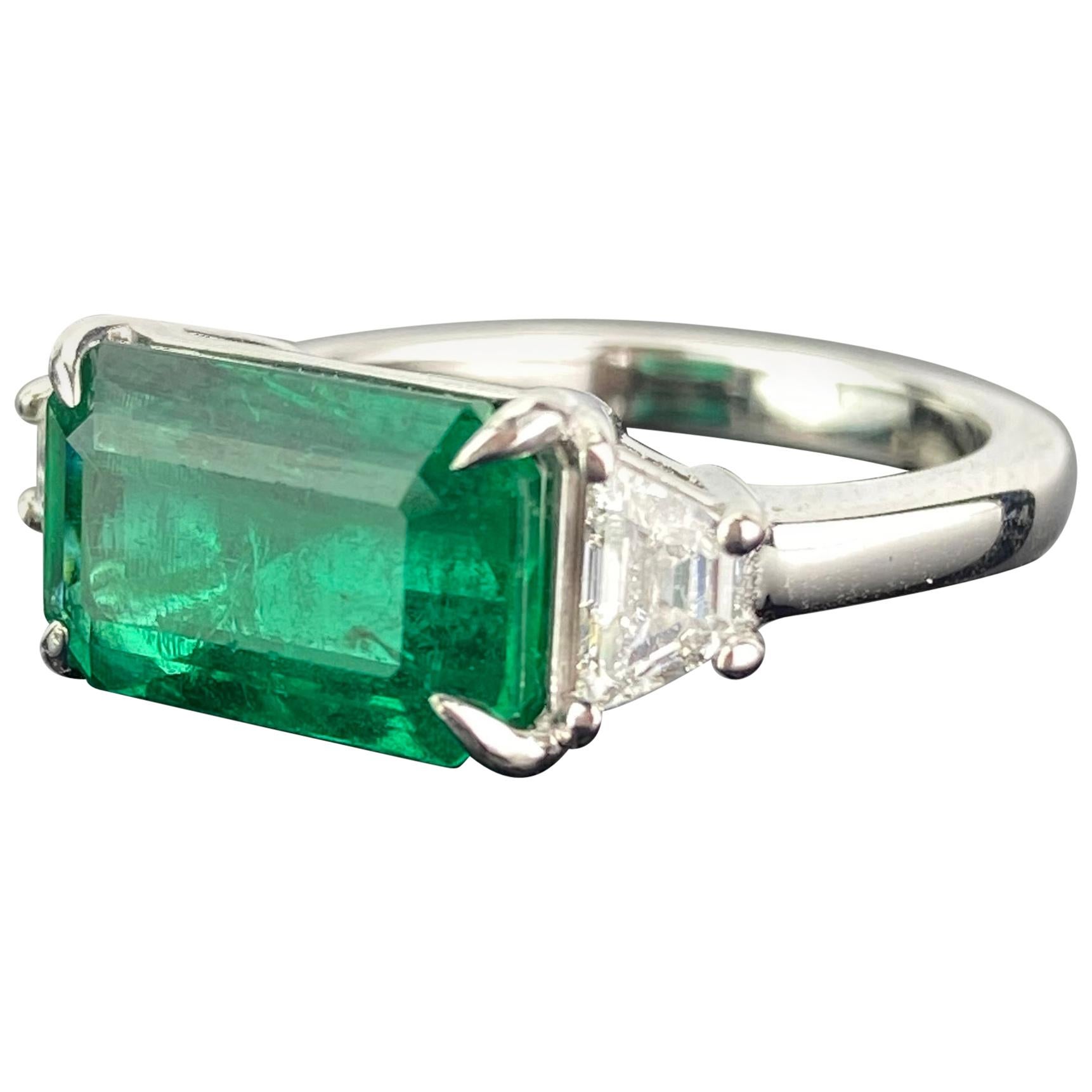 Certified 3.42 Carat Emerald and Diamond Three-Stone Engagement Ring