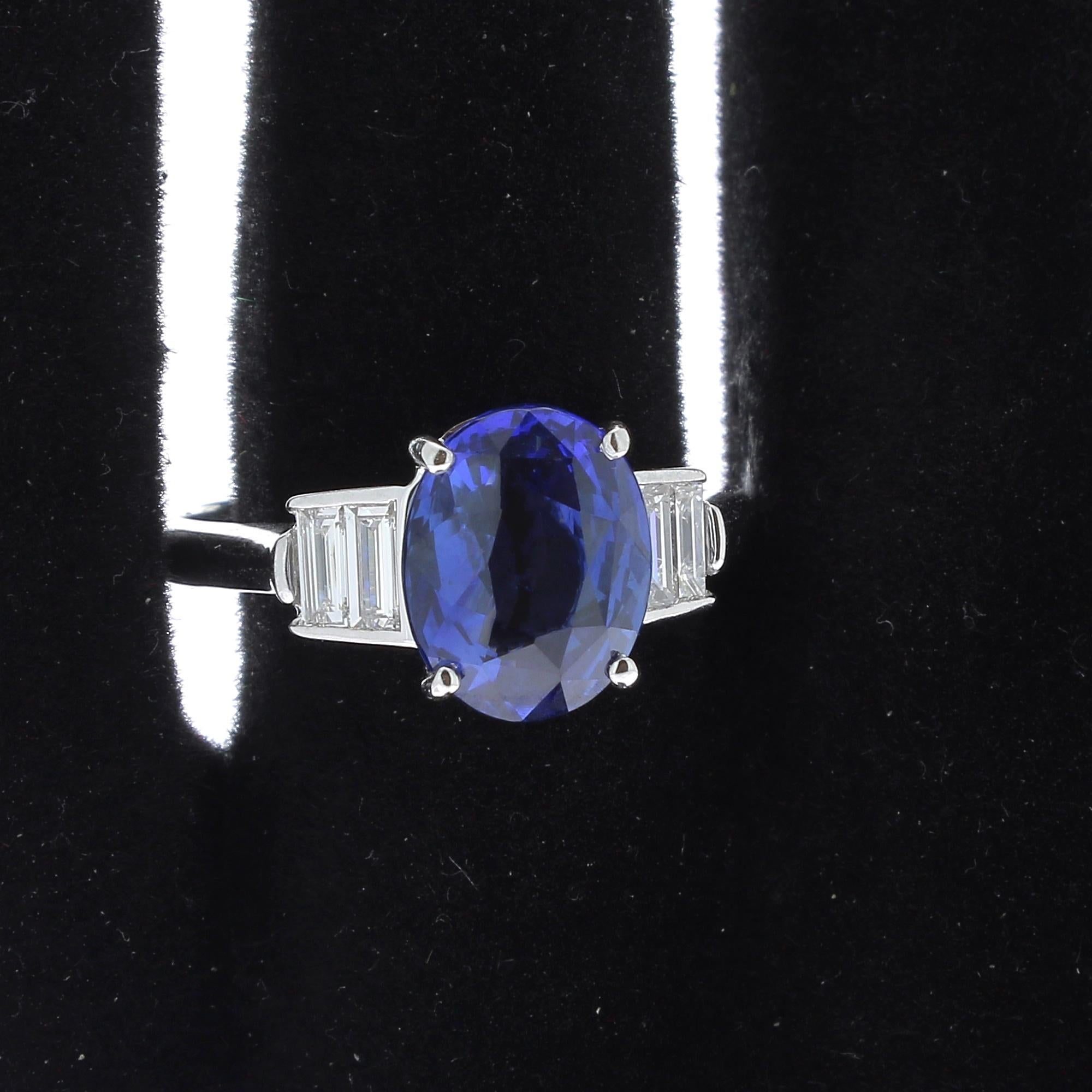 Oval Cut Certified 3.52 Carat Untreated Blue Sapphire and Diamond Rings