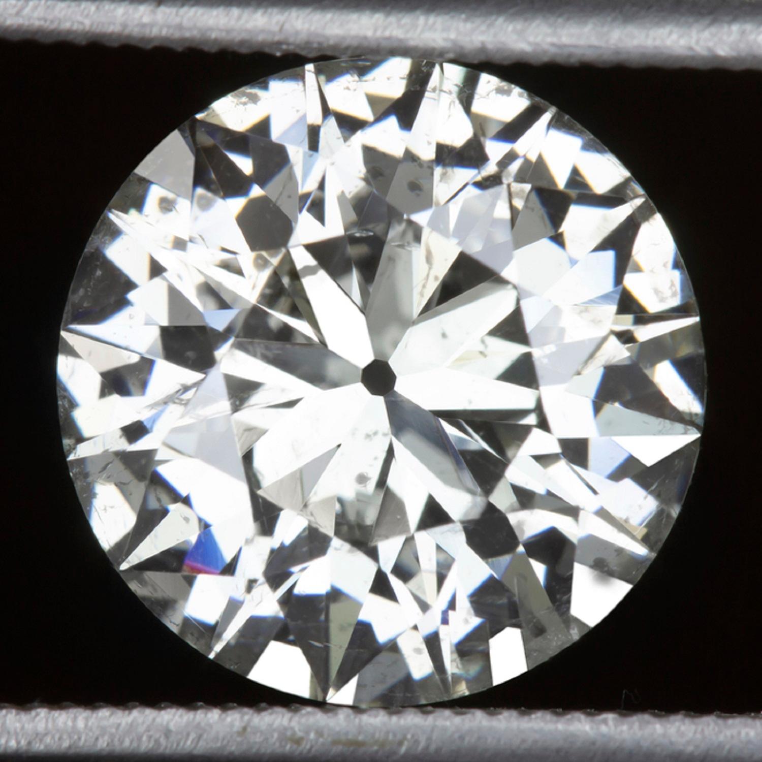 GIA Certified 3.27 carat old european cut certified diamond is beautifully white, eye clean, and vibrant with gorgeous life and fire. Measuring 9.14 mmx 9.64 mm in diameter, the diamond has a great spread and large look for its weight!

Cut entirely