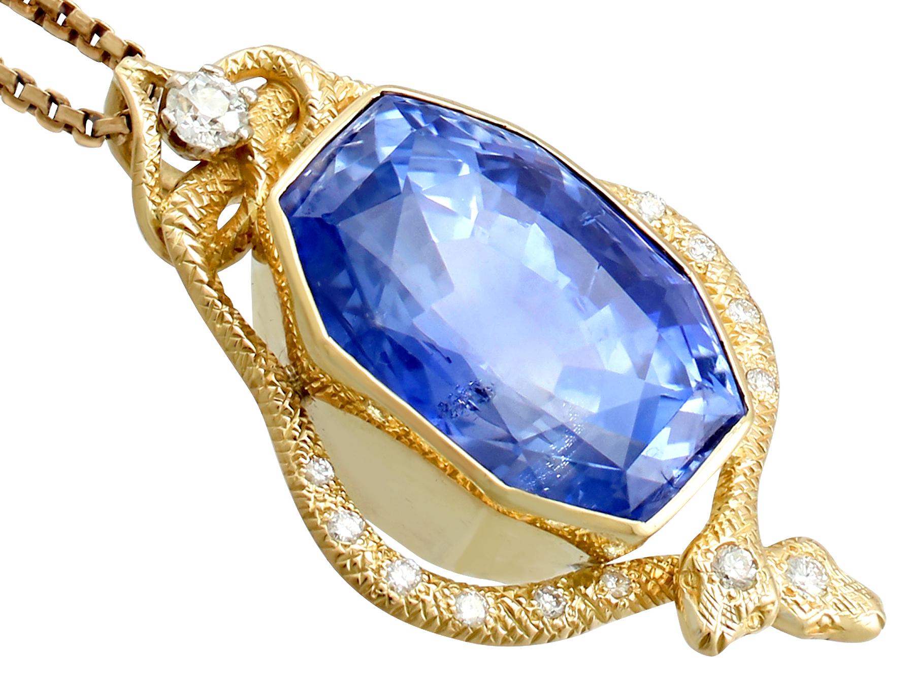 Oval Cut Certified 36.50 Carat Ceylon Sapphire and Diamond Yellow Gold Snake Pendant