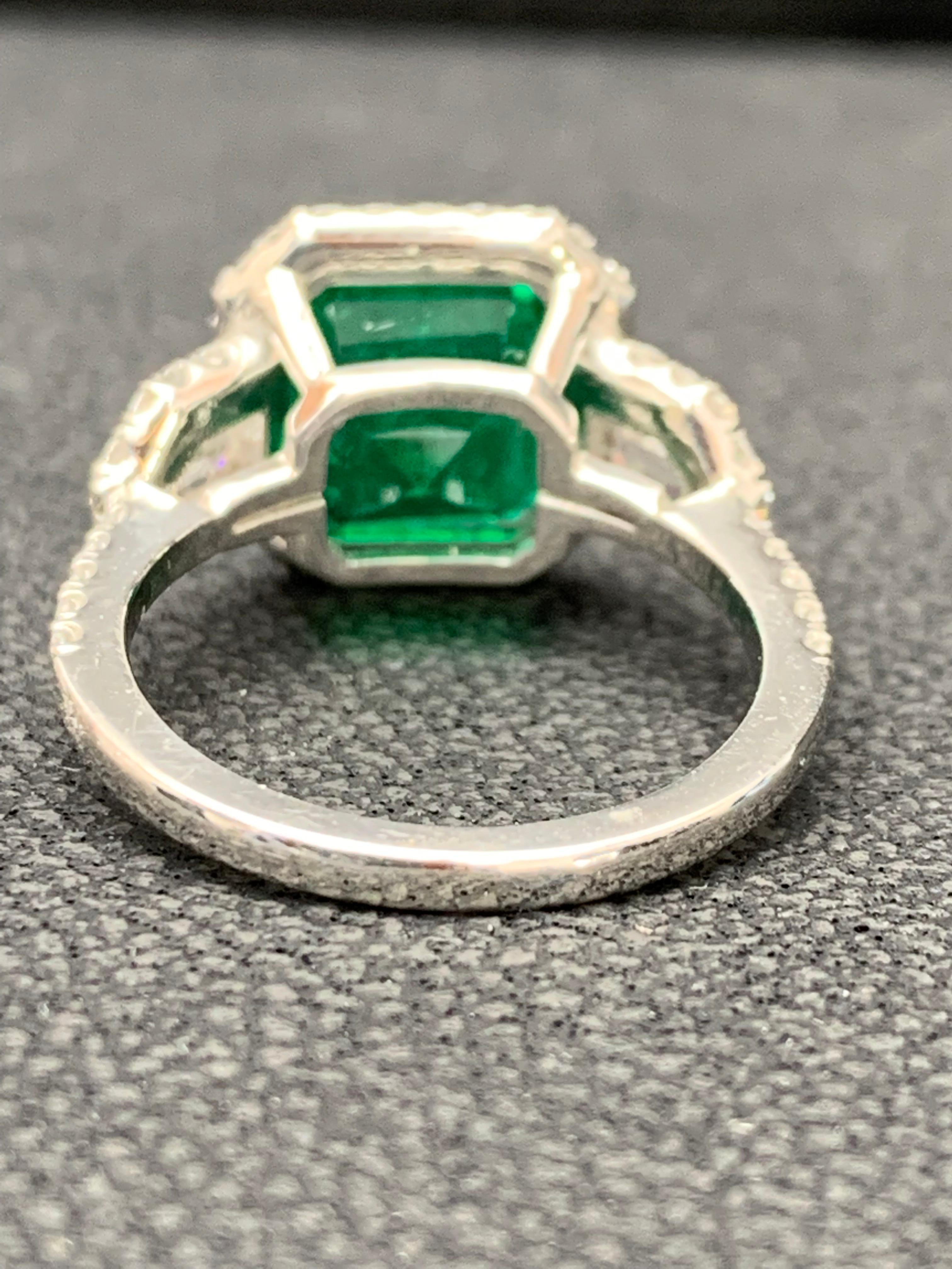 Certified 3.69 Carat Emerald and Diamond Three Stone Engagement ring in platinum For Sale 7