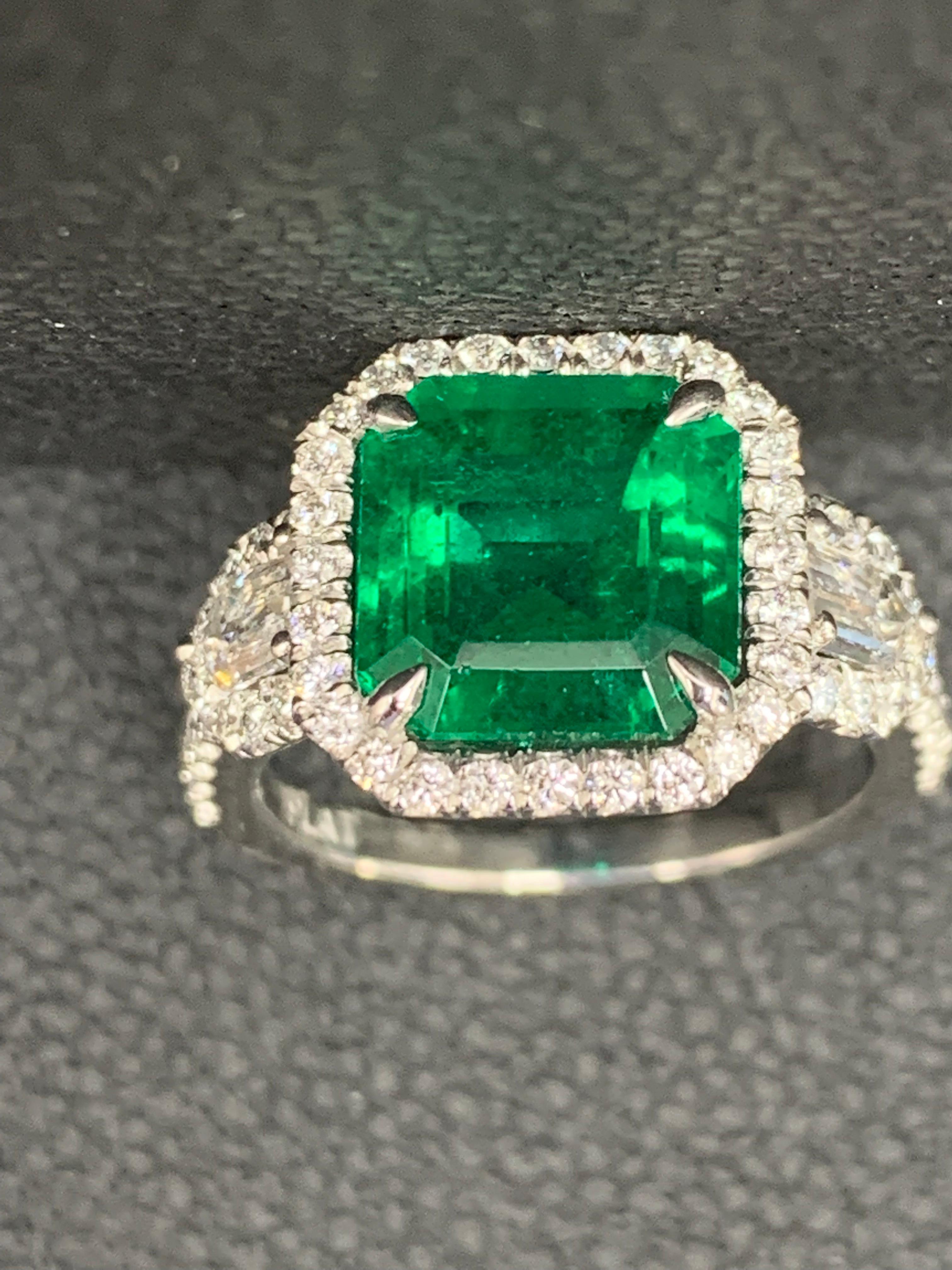 Certified 3.69 Carat Emerald and Diamond Three Stone Engagement ring in platinum For Sale 9