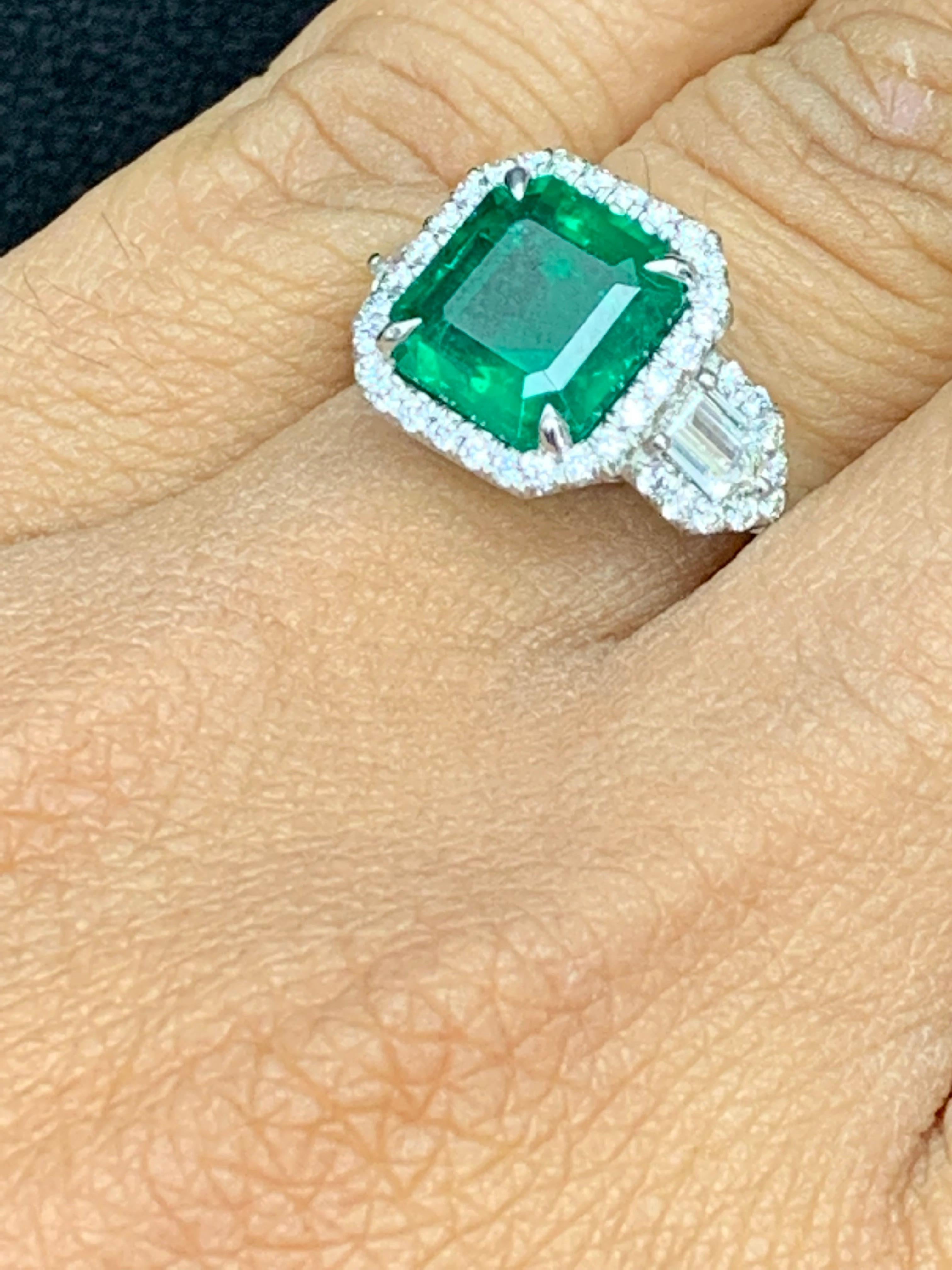 Modern Certified 3.69 Carat Emerald and Diamond Three Stone Engagement ring in platinum For Sale