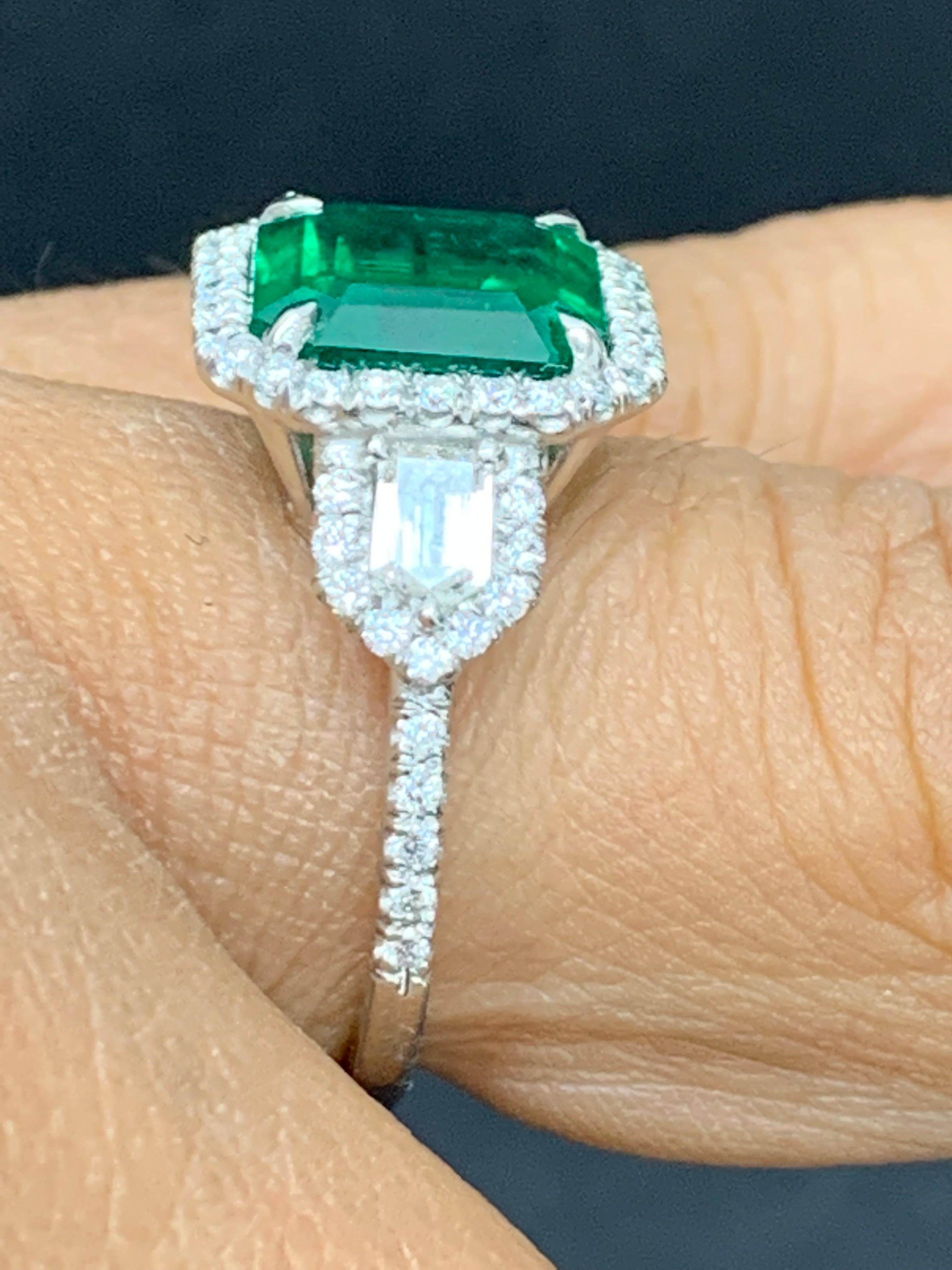 Certified 3.69 Carat Emerald and Diamond Three Stone Engagement ring in platinum For Sale 1