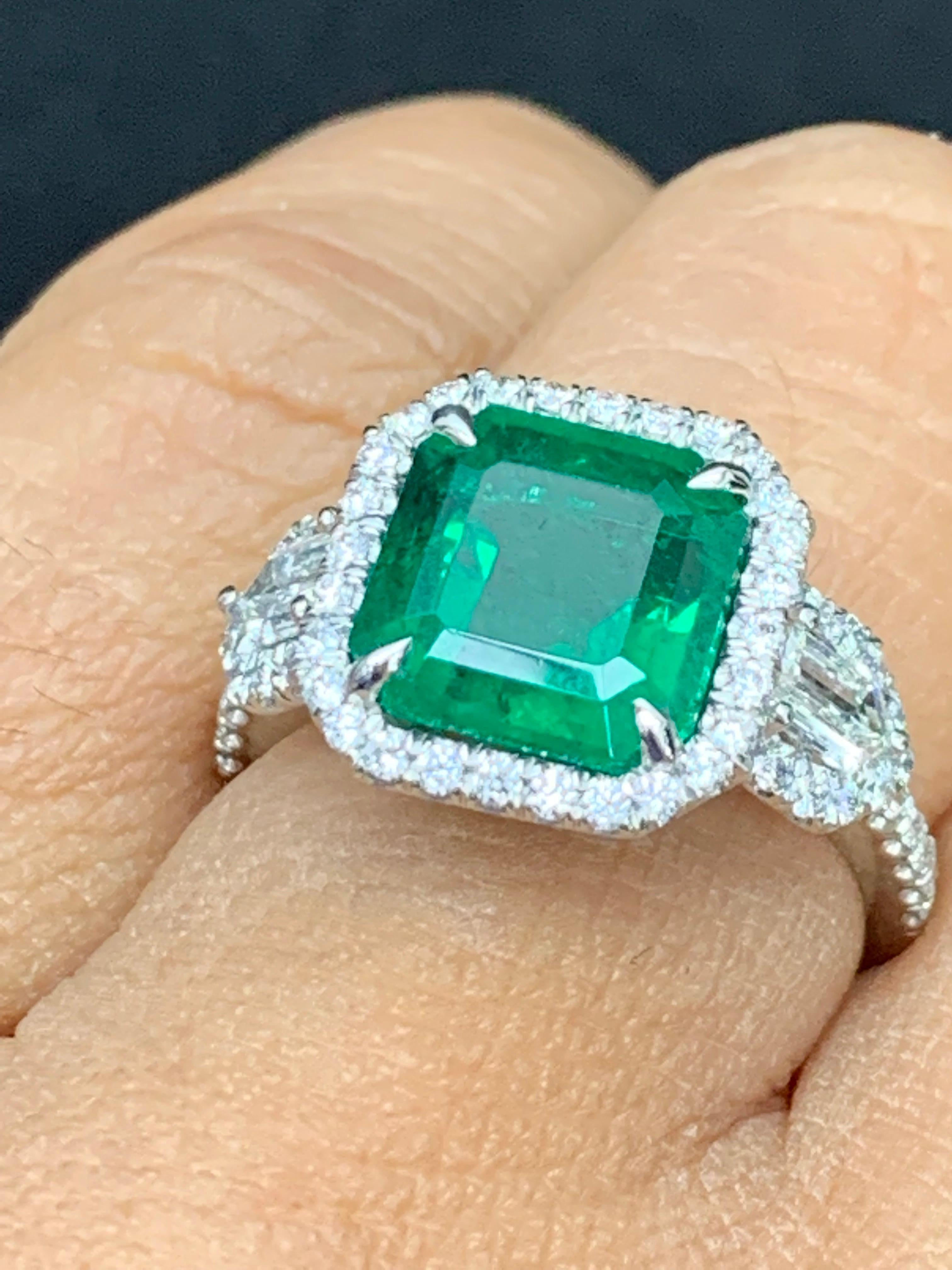 Certified 3.69 Carat Emerald and Diamond Three Stone Engagement ring in platinum For Sale 3