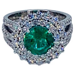 Contemporary 3.82 Carat Colombian Emerald Halo Diamond Cocktail Ring