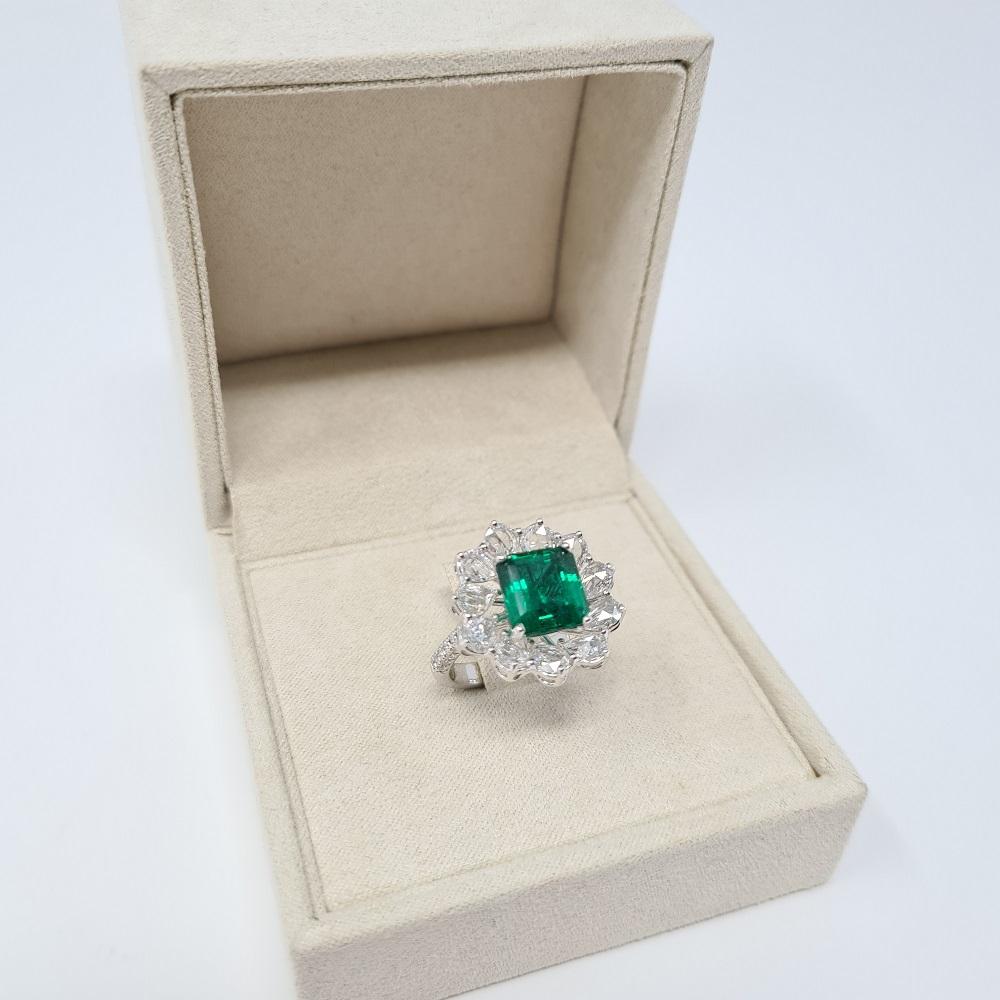 Octagon Cut Certified 3.86 Ct Emerald 1.97 Ct Diamonds 18kt White Gold Engagement Ring For Sale