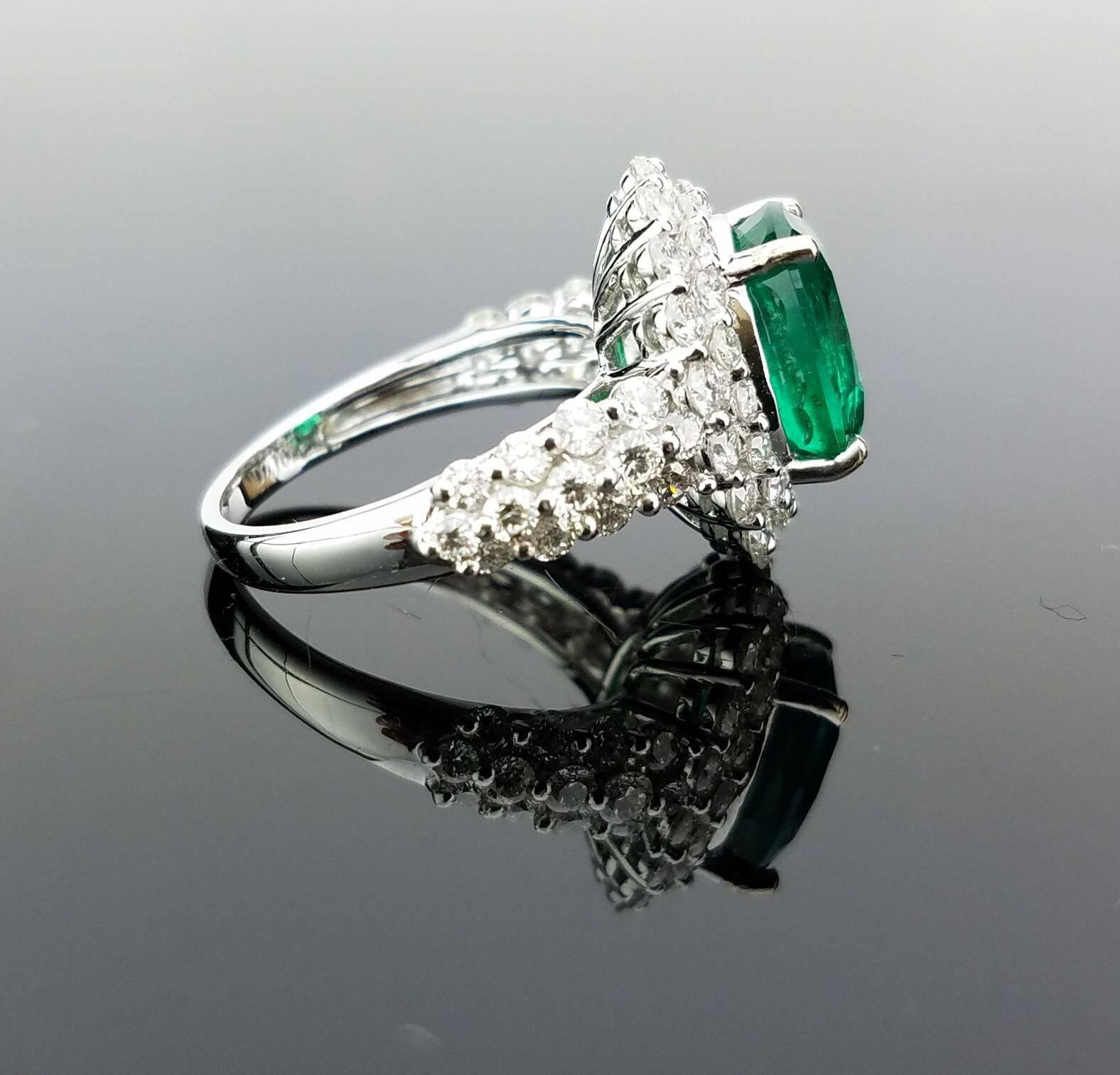Oval Cut Certified 3.91 Carat Oval Emerald and Diamond Cocktail Ring For Sale