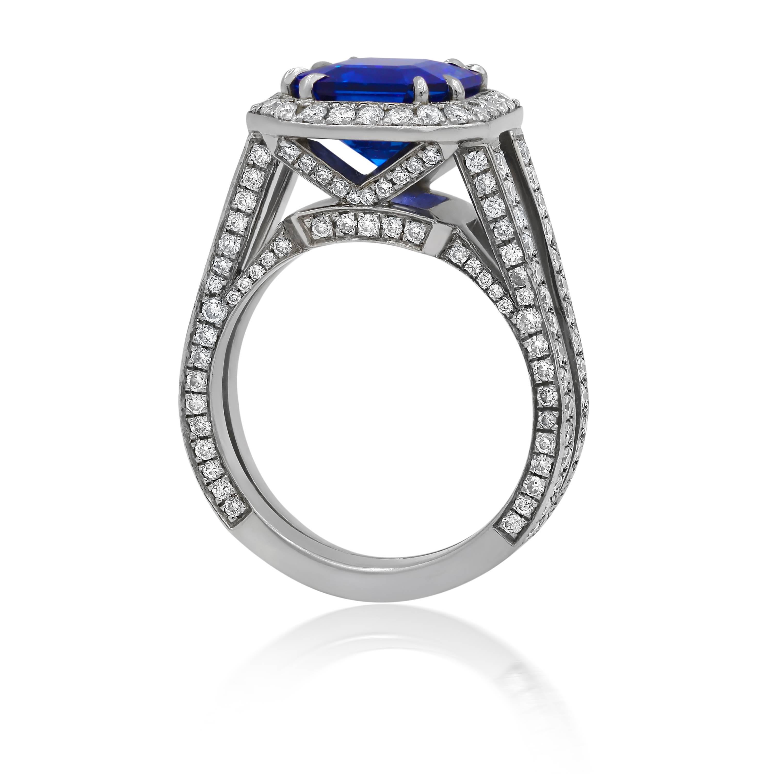 18k white gold sapphire ring features 3.98 carat total weight of emerald cut sapphire as a center stone and 1.20 ct total weight of diamonds