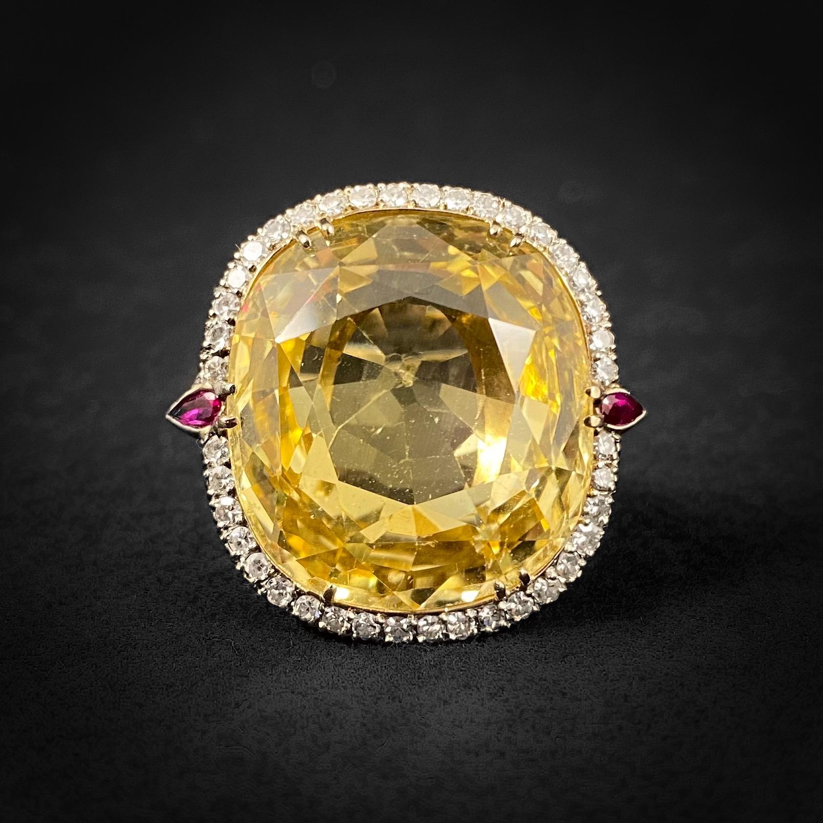 Certified 40-carat natural unheated Ceylon (Sri Lankan) yellow sapphire, ruby and diamond cluster cocktail ring in 14kt yellow gold. Made in an unusual warm alloy that is in between yellow and white gold, this vintage jewel features a rare cushion